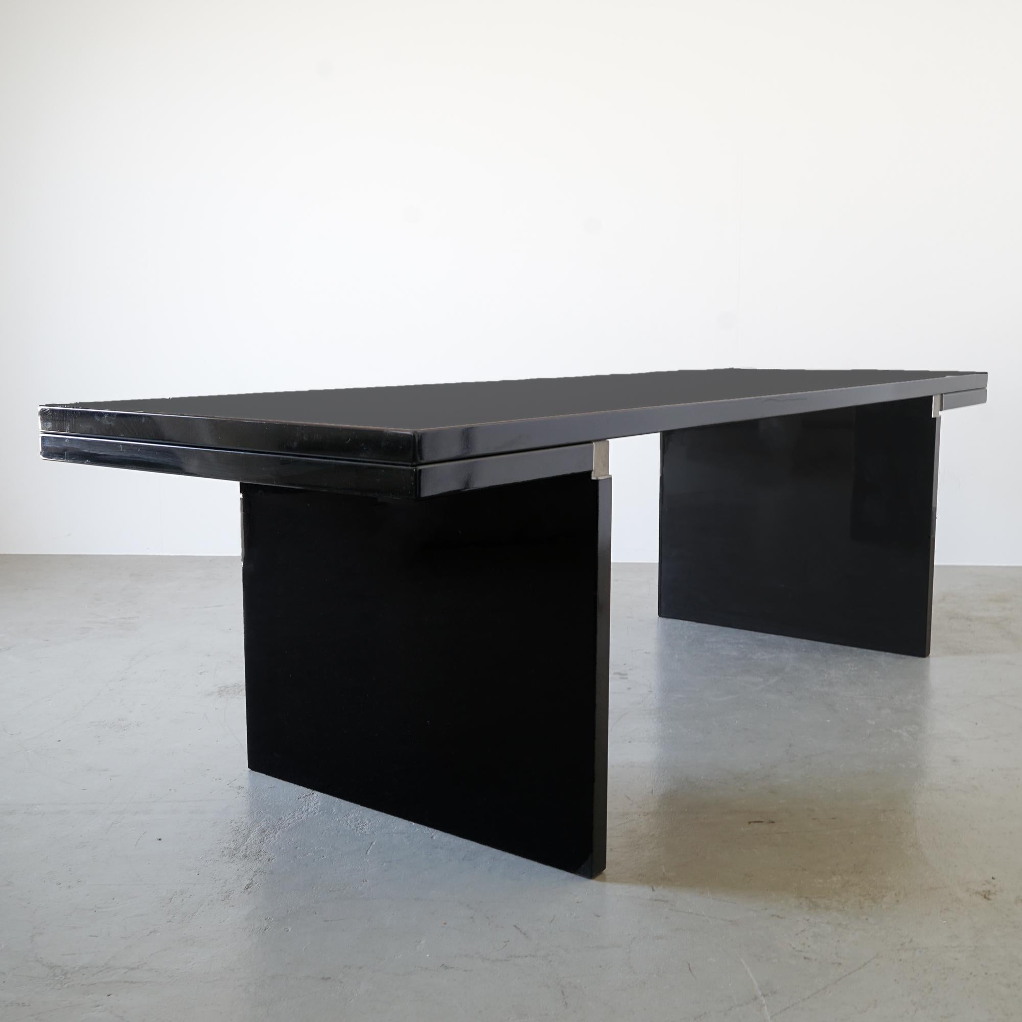 This sculptural-looking table by the italian designer, architect and artist Carlo Scarpa was produced, circa 1972-1973 as part of the Simon Collezione by Cassina. The classically formal table, in which the formal language of geometry predominates,