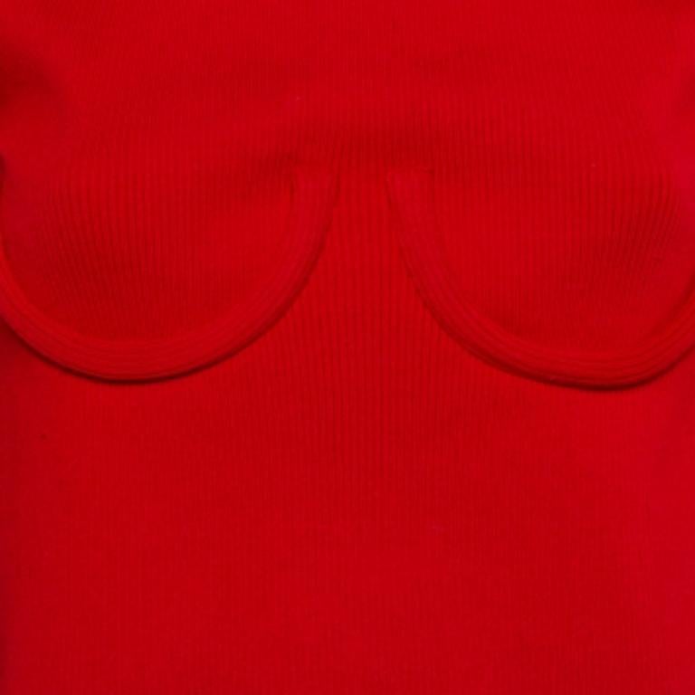 An off-shoulder crop top by Orseund Iris made from stretch fabric and featuring underwire details, long sleeves with slit, and frayed edges. In the label's words: This is an original, just like you.