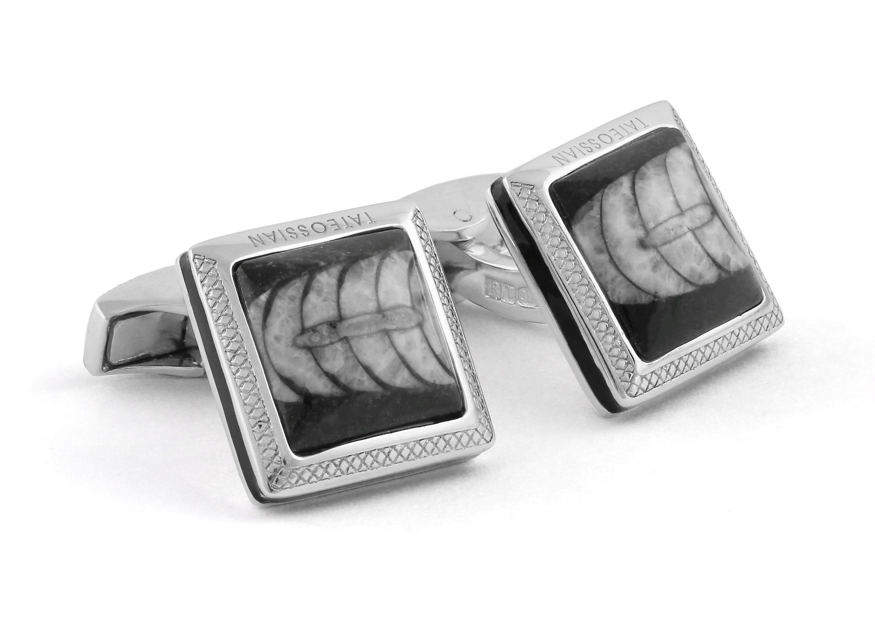 Orthoceras fossils are the remains of a 400 million years old mollusc, now beautifully transformed into wearable cufflinks. These fossils originated in Morocco and feature an elongated, long slender shell with tones of greys. The top of the shell is