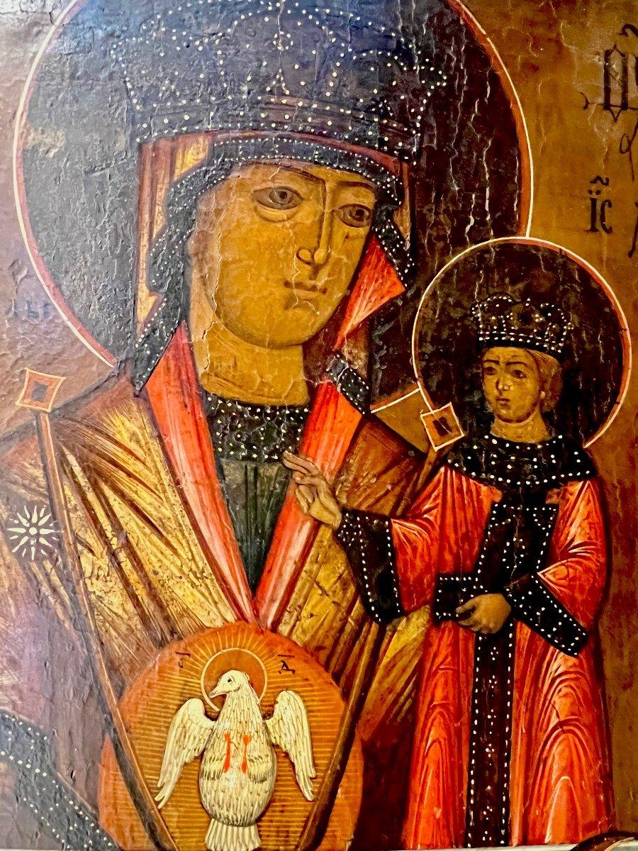 Although the exact origins of this icon are uncertain, it is believed to have originated in southwestern Russia during the 18th and 19th centuries. The Russian name on the icon's left side translates to 