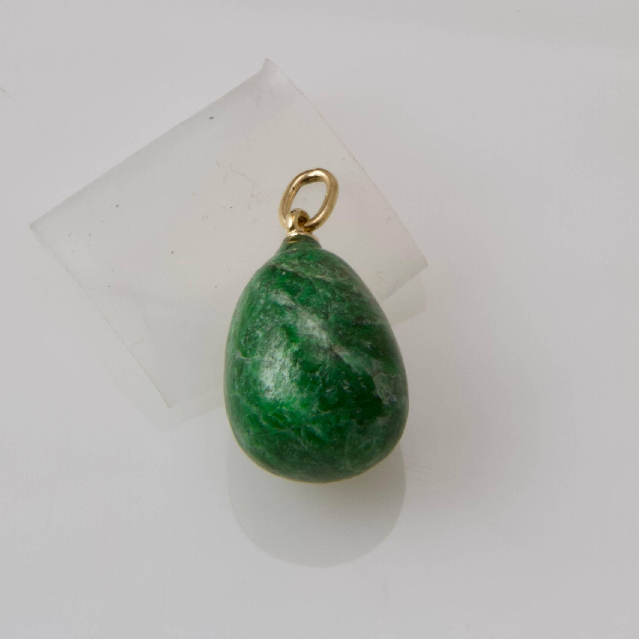 New! Jade nephrite egg mounting on 18kt gold ring.