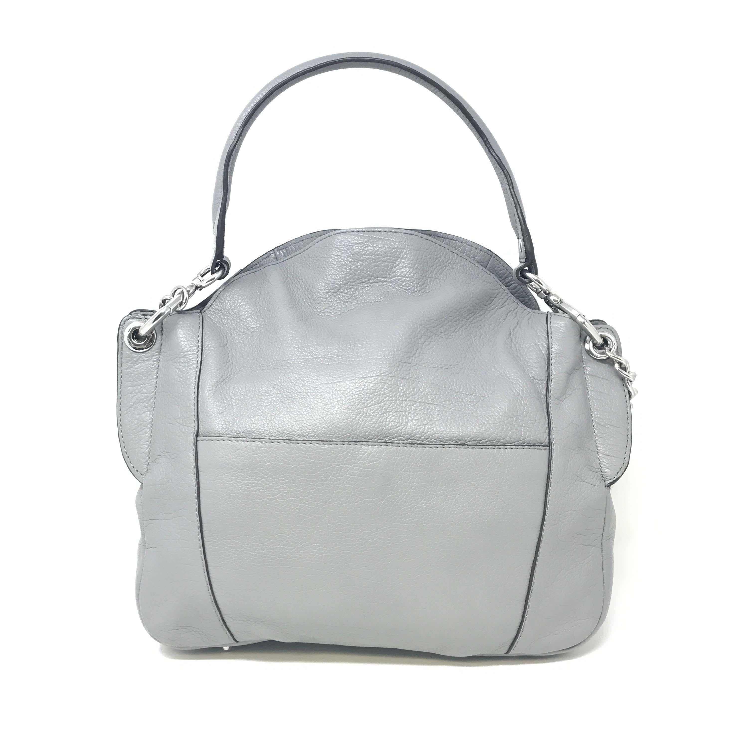 This 100% authentic orYANY Danielle A26581706 Italian Leather Convertible Grey Ladie's Shoulder Bag is a new and does not come with box and papers. It's in excellent condition.
Details:
Brand	orYANY
Strap