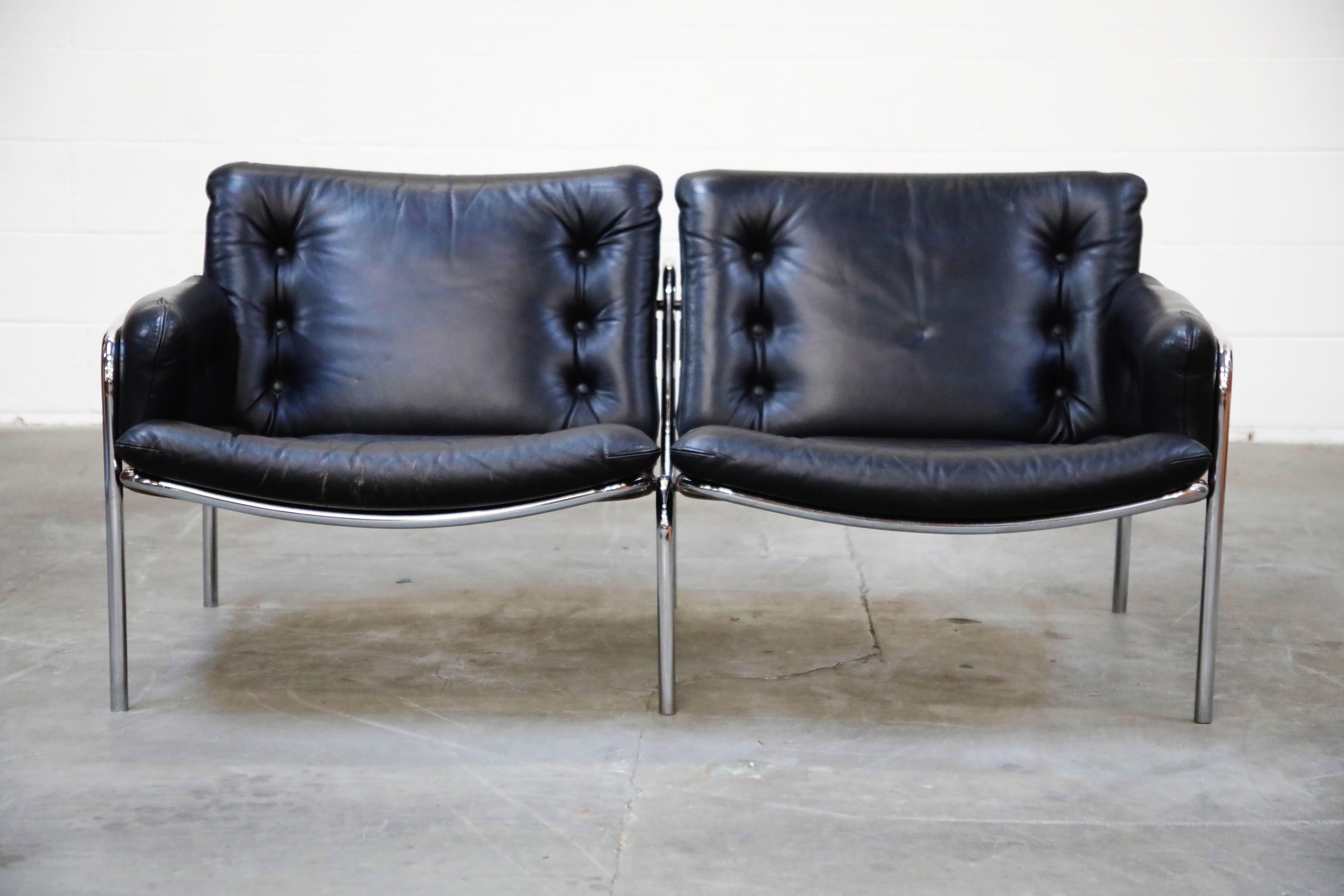 Designed in 1969, this black leather and chrome frame 'Osaka' two-seat sofa settee by Martin Visser for 't Spectrum Bergeijk, was showed at the 1972 World Fair in Kyoto, Japan. This design was only produced for a short period of time, making this