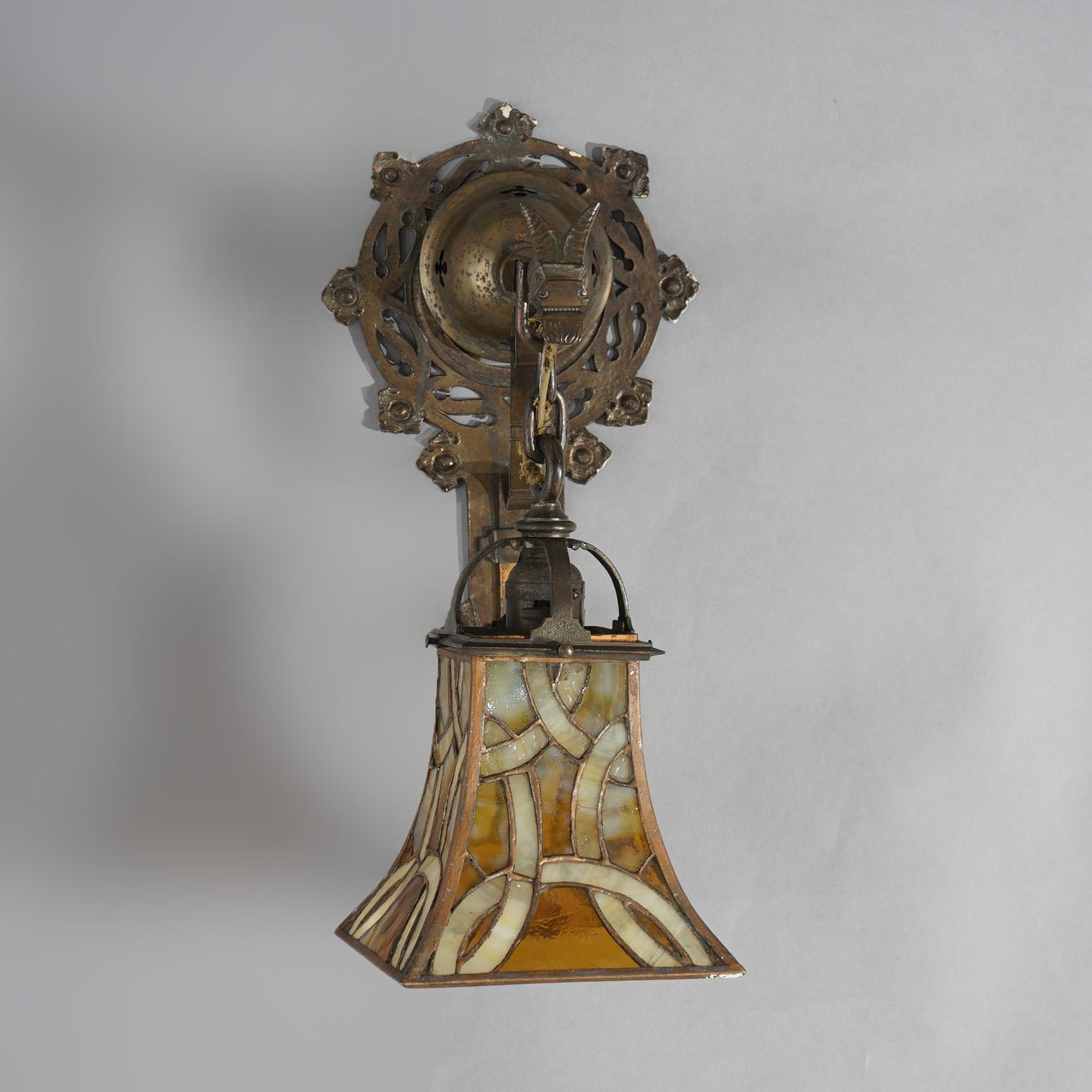 Oscar Bach Arts & Crafts Figural Hammered Bronze & Leaded Glass Wall Sconces In Good Condition For Sale In Big Flats, NY