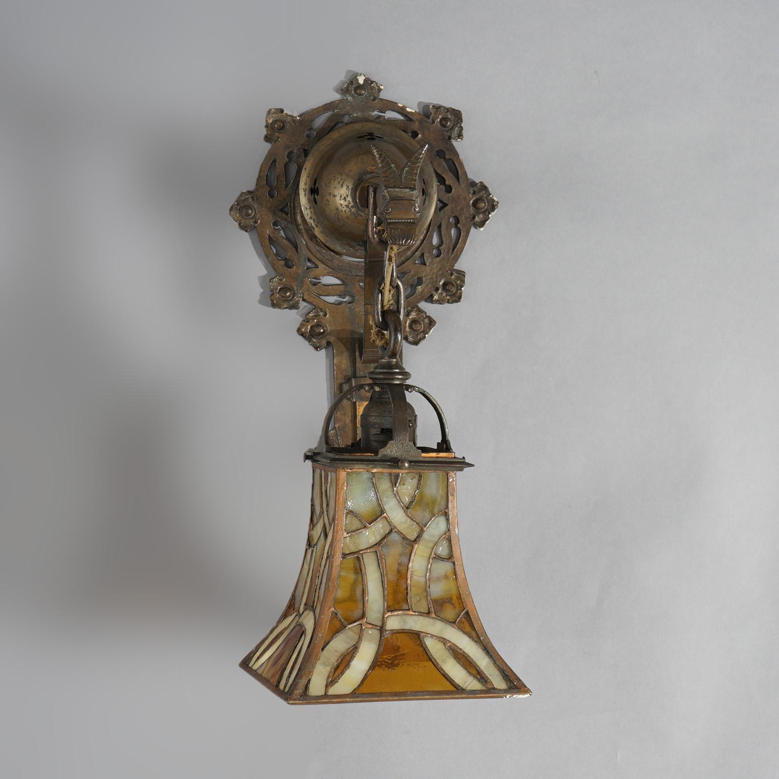 Oscar Bach Arts & Crafts Figural Hammered Bronze & Leaded Glass Wall Sconces In Good Condition In Big Flats, NY