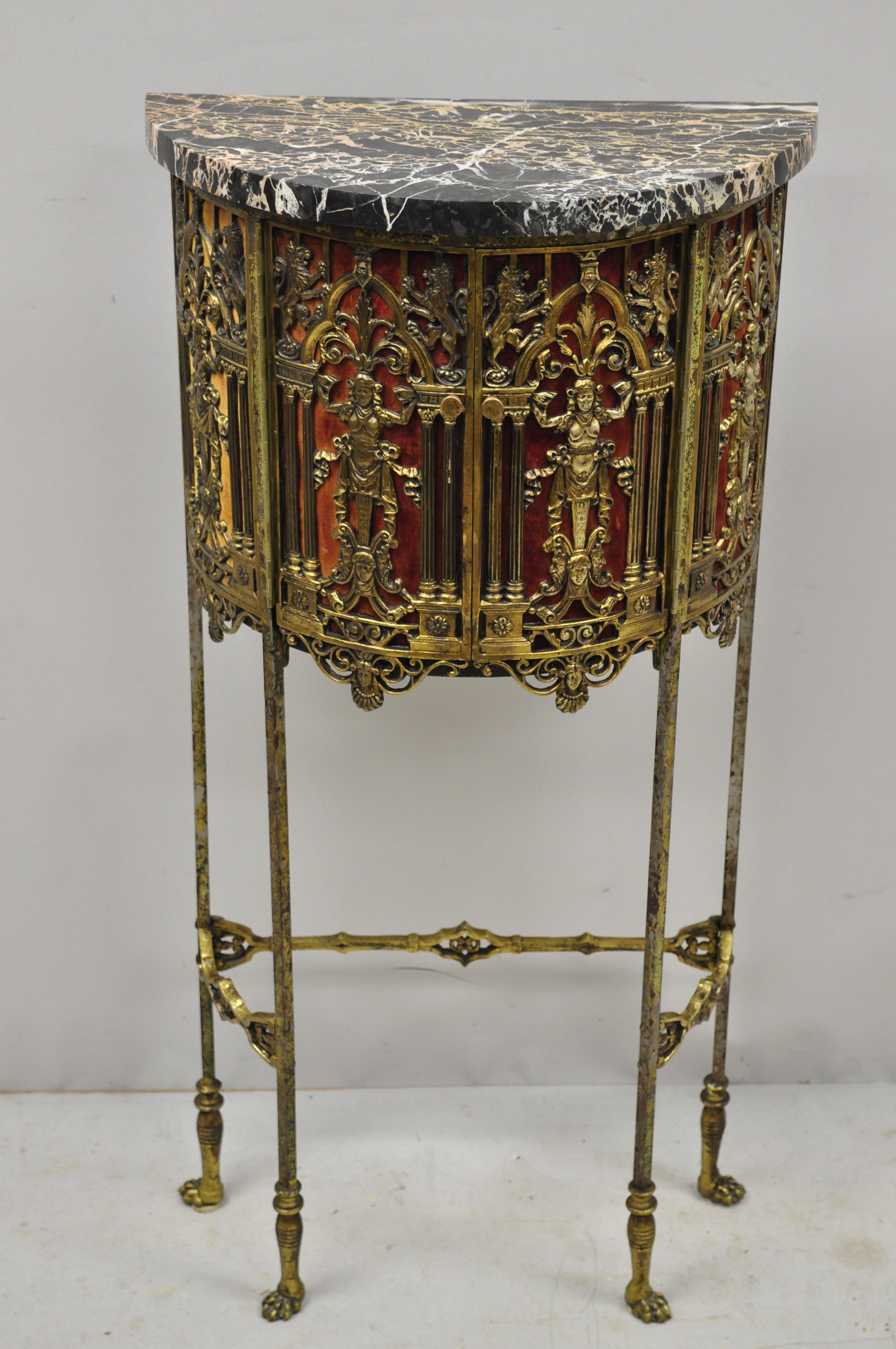 Oscar Bach attributed figural bronze marble-top telephone hall stand with chair. Item features an ornate figural bronze telephone cabinet stand, marble top, small chair with needlepoint seat, wonderful patina, paw feet, very nice antique item,