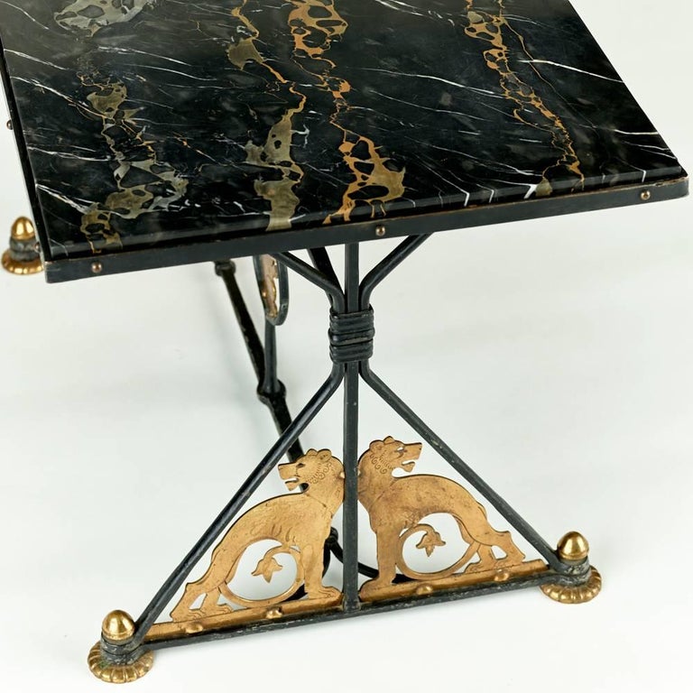 Oscar Bach marble and bronze coffee table

New York, circa 1920s.

Measures: 19.75 x 32 x 18.75 in.

Marble, wrought iron, bronze

Signed

Provenance: Property of a private collector, Delaware.
 