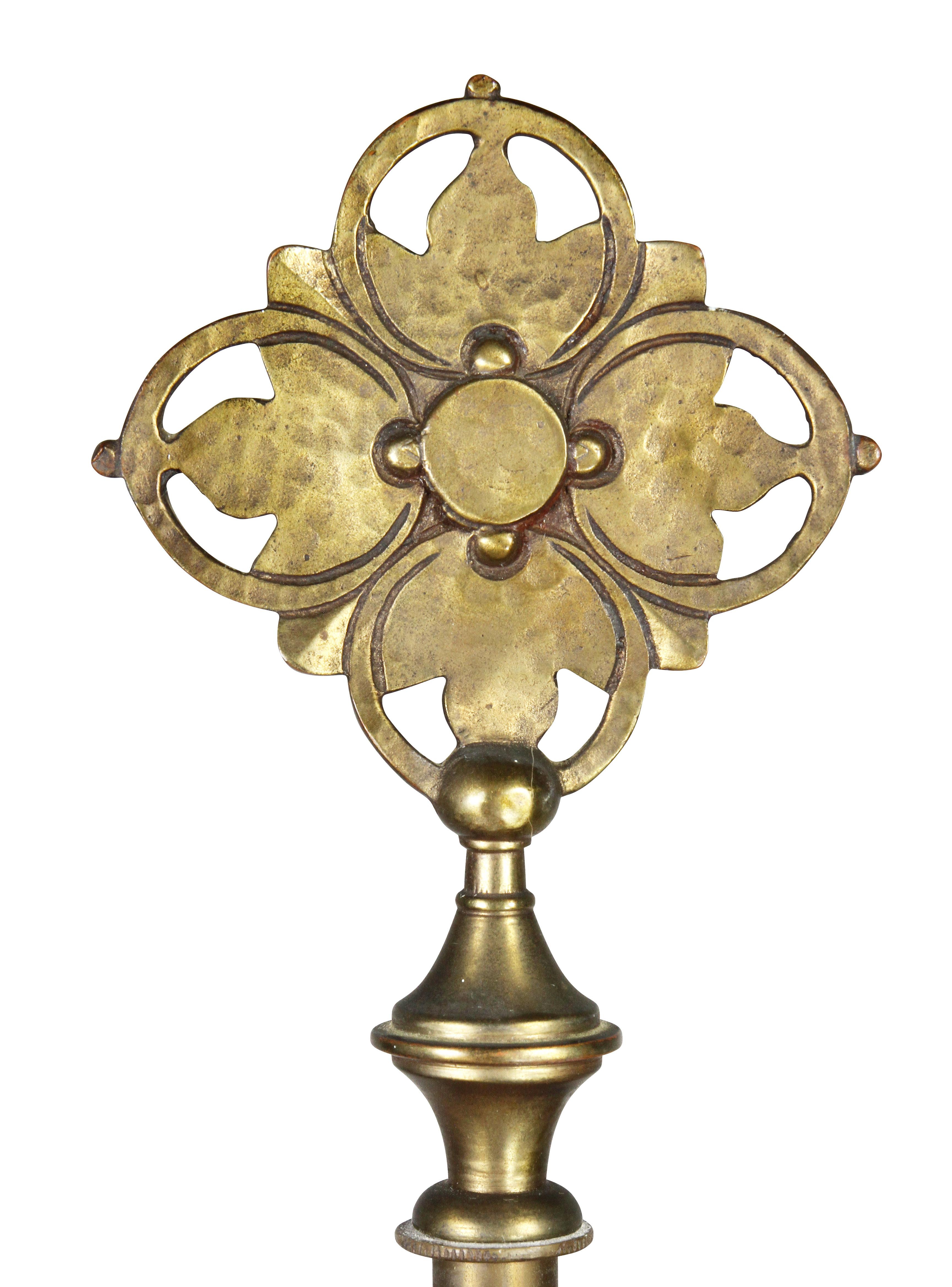 With original finial, typical form with circular base with incised decoration. Signed on base.