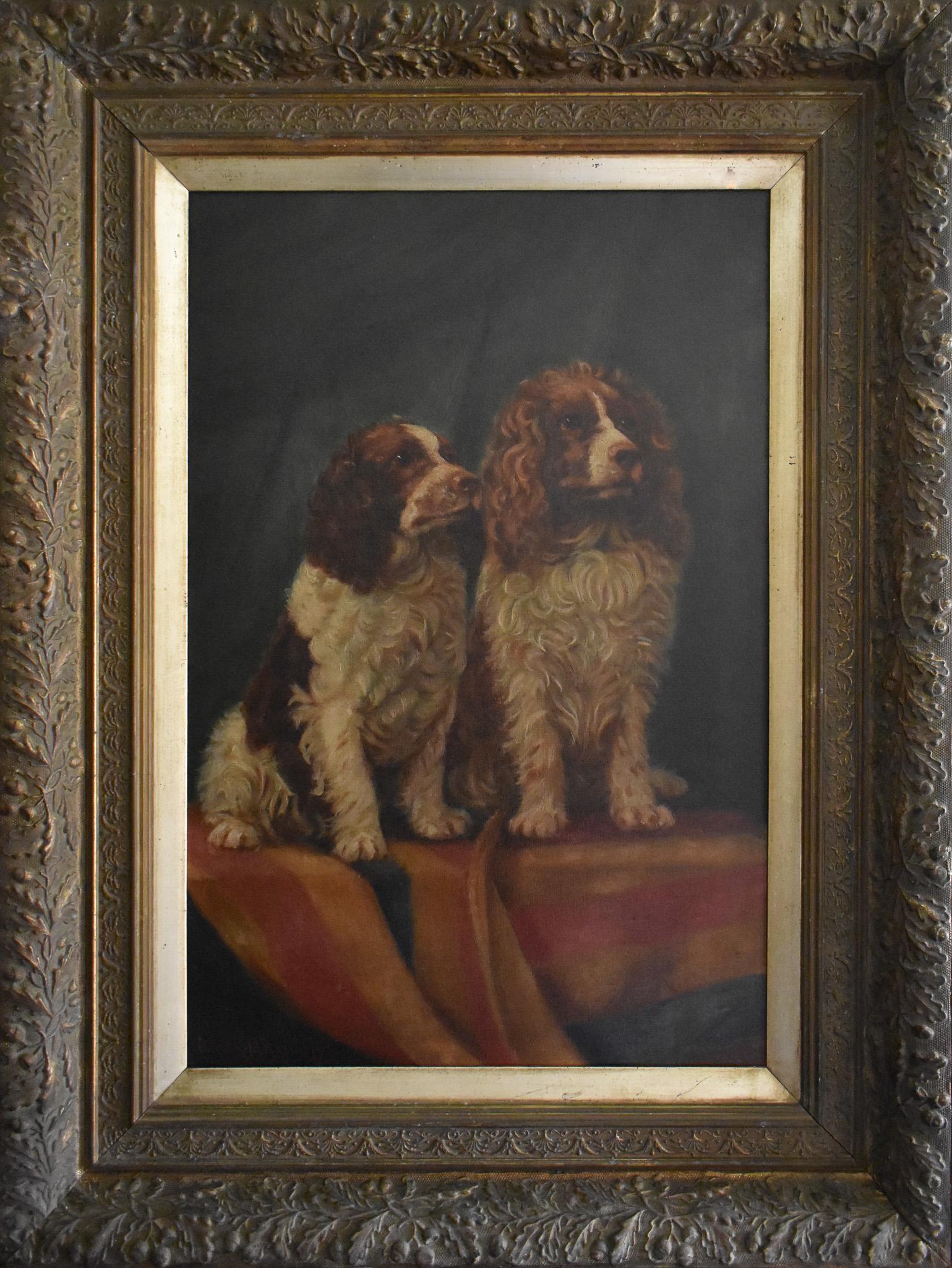 Two well-behaved clumber spaniels, seated on a Witney blanket