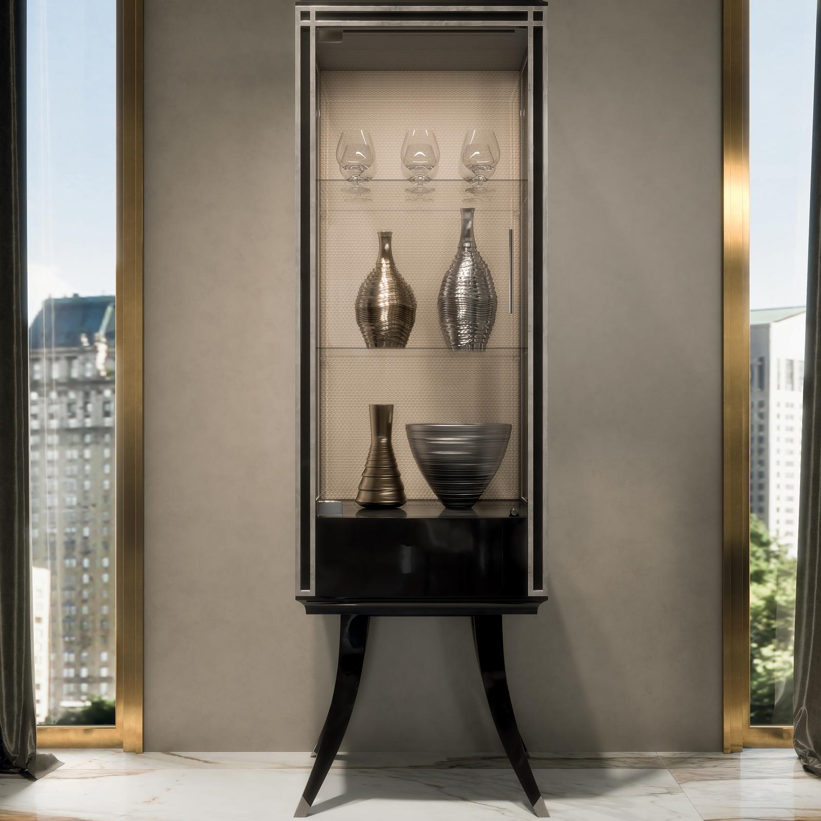 Featuring a splendid polished finish with silver leaf detail, this remarkable Cabinet is a furnishing piece of refined quality. This spectacular Cabinet features 1 door and 1 drawer with push pull blumotion, tempered glasses and led lights. Crafted
