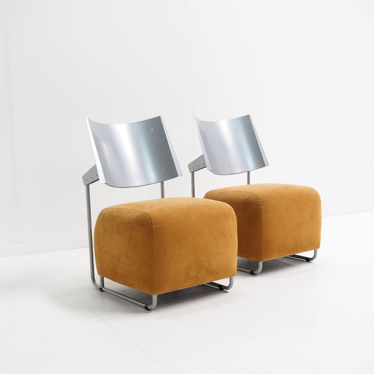 Beautiful set of postmodern chairs designed by the Finnish designer Harri Korhonen for his company Inno Interior Oy. The chairs were designed in 1989 and this set was probably produced in the 1990s.

The chairs are made of an aluminum steel frame