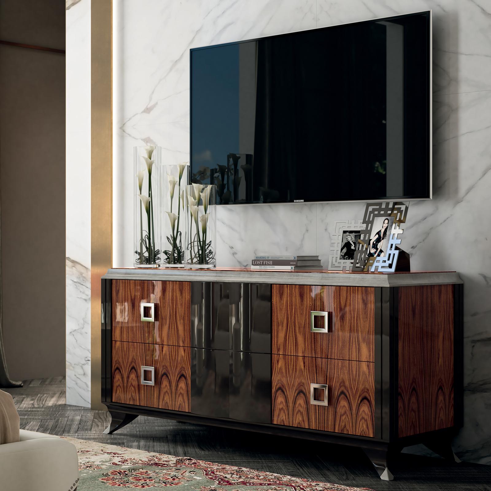 Captivating and stylish, this item in the new Oscar collection, the chest of 4 drawers, boasts a bold yet elegant design with elements of Santos rosewood that will adapt to any decor with a contemporary, cosmopolitan flavor. The splendid polished