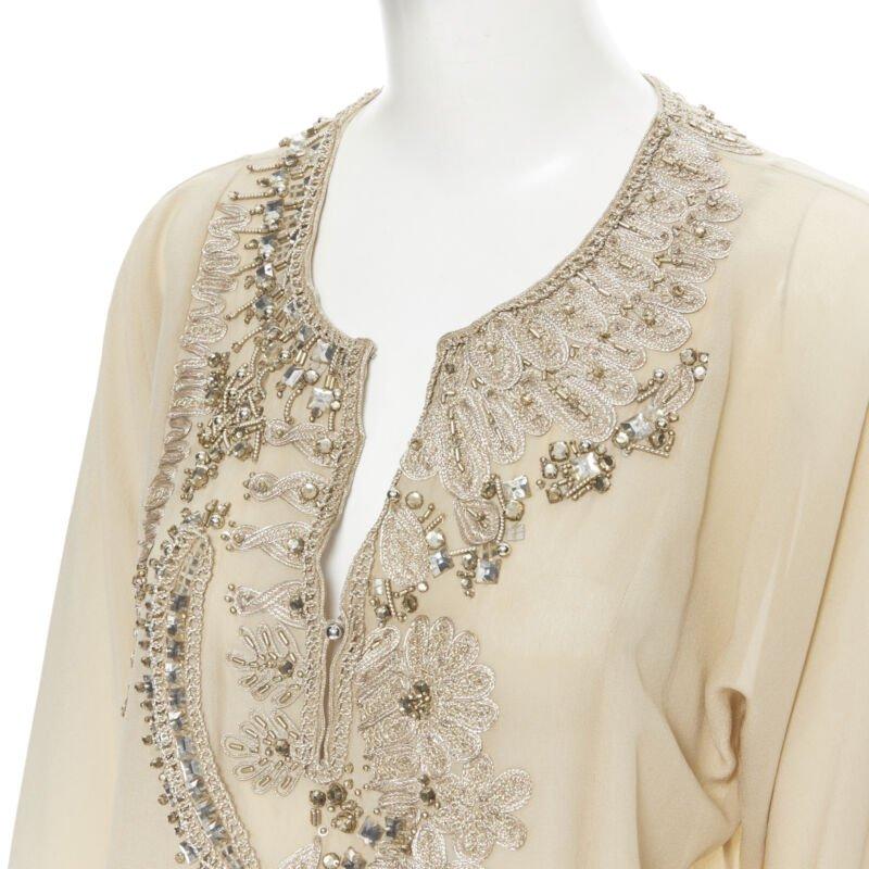 OSCAR DE LA RENTA 100% silk beige crystal embroidery collar 3/4 sleeve blouse XS
Reference: LNKO/A01687
Brand: Oscar de la Renta
Designer: Oscar De La Renta
Collection: 2010
Material: Silk
Color: Beige
Pattern: Solid
Closure: Button
Extra Details: