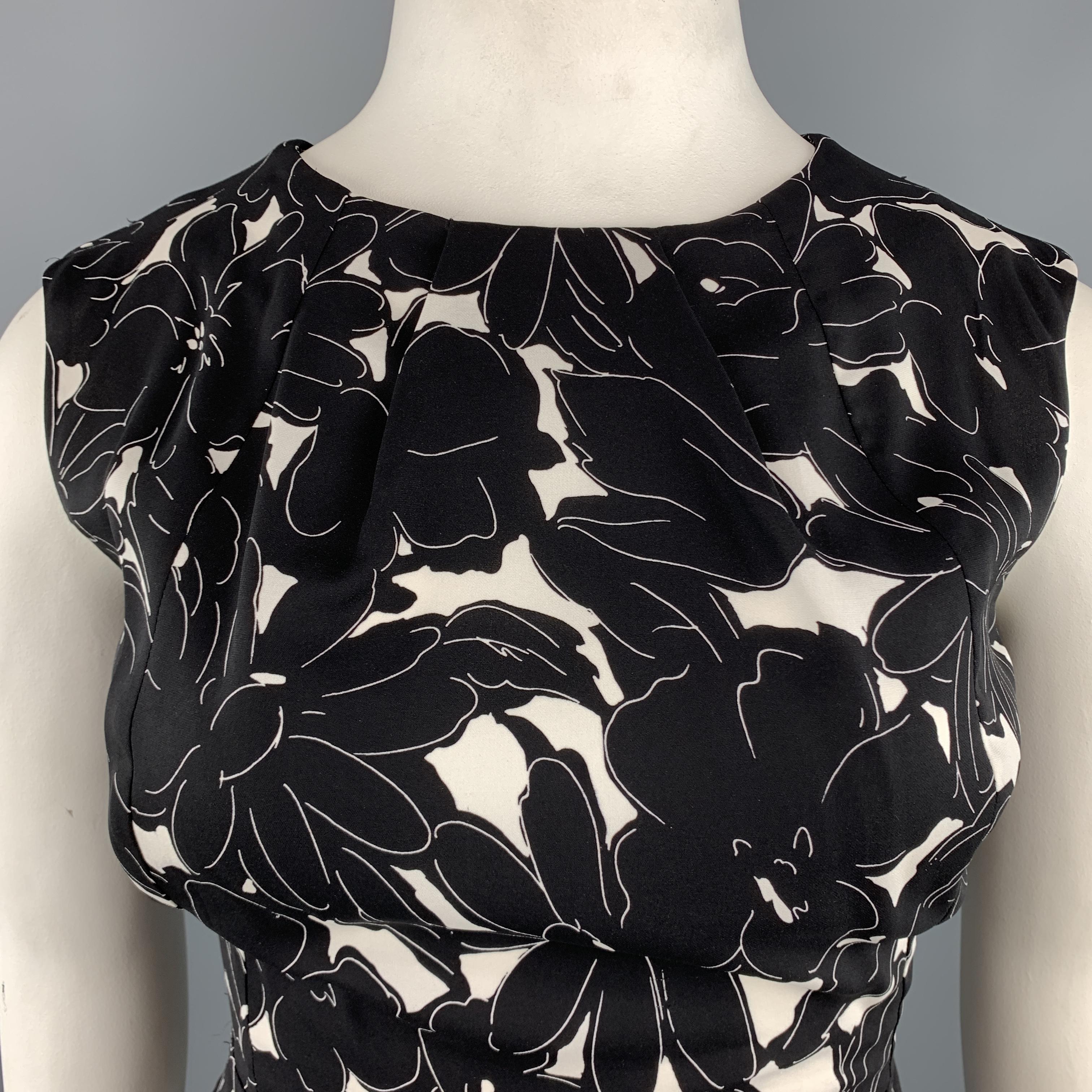 OSCAR DE LA RENTA sleeveless shift dress comes in black and white floral print stretch silk jersey with a round pleated neckline and pencil skirt with pleats. Made in Italy.

Excellent Pre-Owned Condition.
Marked: 14

Measurements:

l	Shoulder: 16
