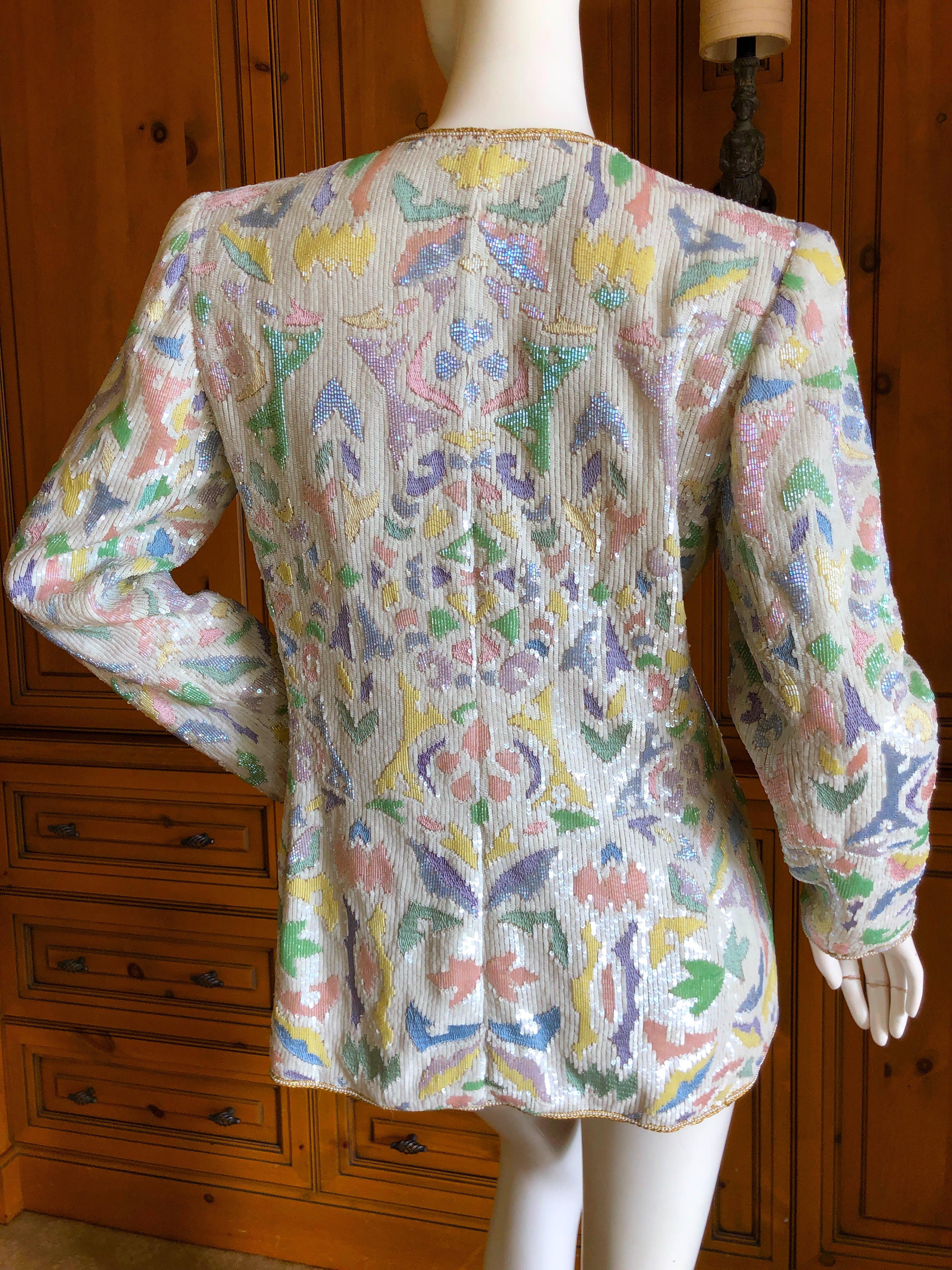 Oscar de la Renta 1980's Pastel Sequin and Pearl Embellished Evening Jacket.
Please use the zoom feature to see all the amazing hand work that went in to creating this.
Marked size 6
Bust 38