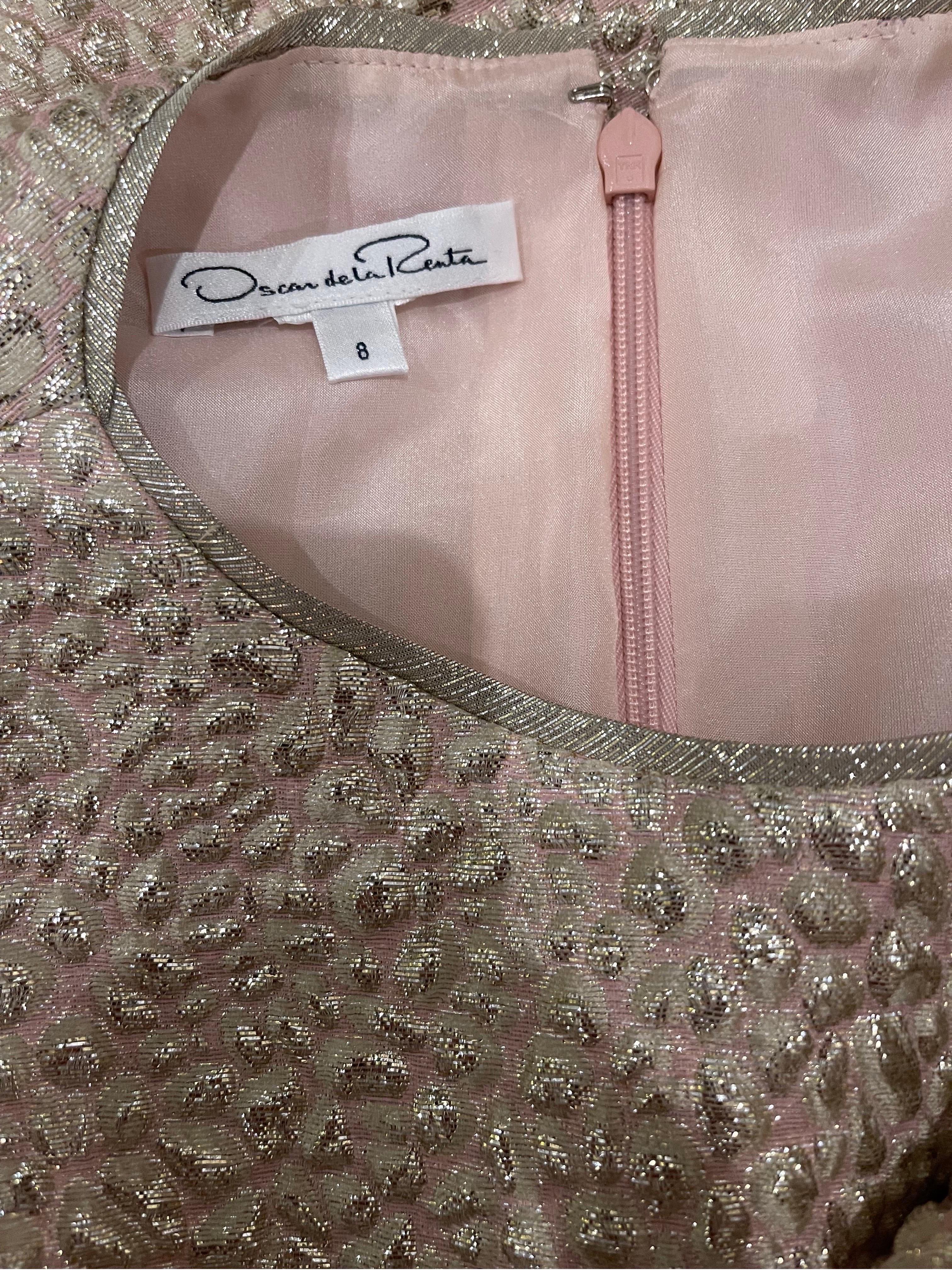 Beautiful early 2000s Y2K OSCAR DE LA RENTA pink, gold and silver metallic silk dress and shirt sleeve bolero jacket ! Dress features a tailored bodice with an A-Line skirt. Hidden zipper up the back with hook-and-eye closure. Bolero has