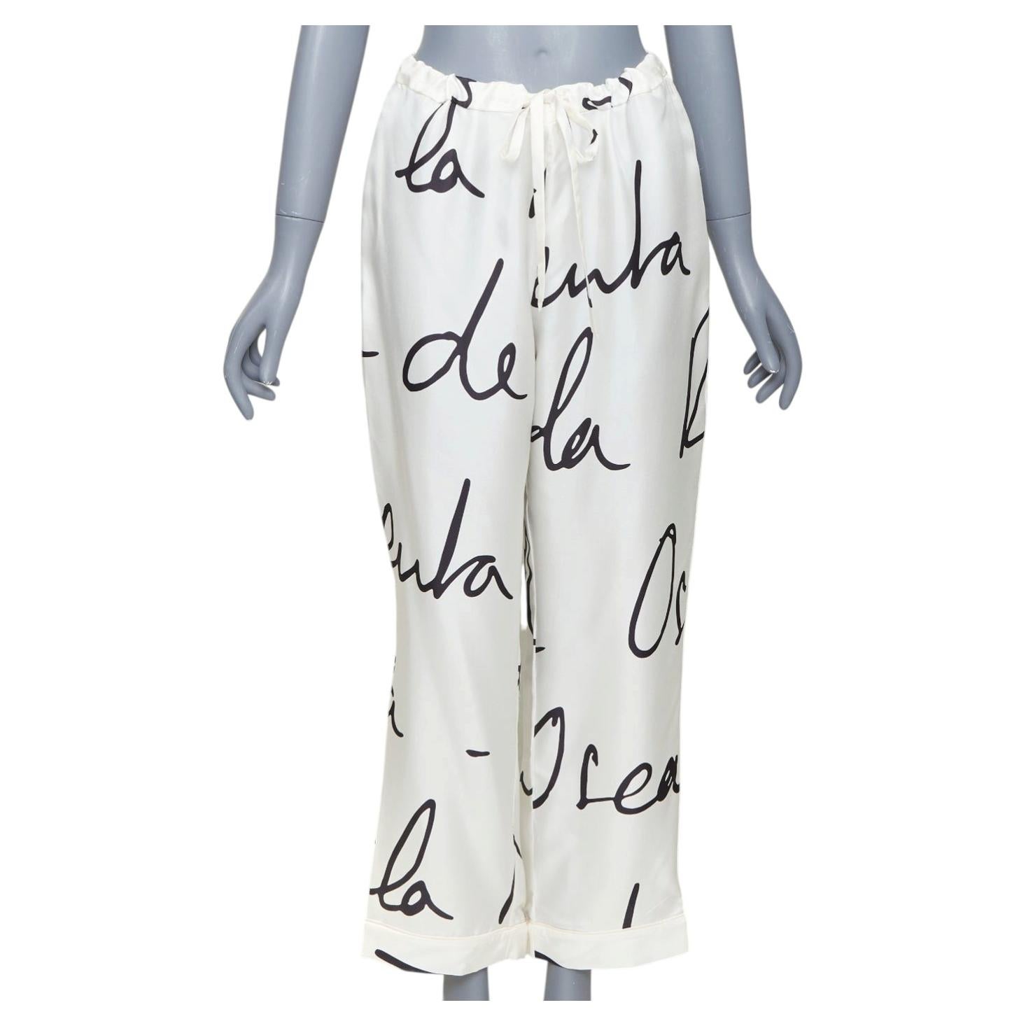 Oscar De La Renta 2021 Pantalones ajustados de seda 100 % en blanco y negro con estampado de grafitis, talla XS