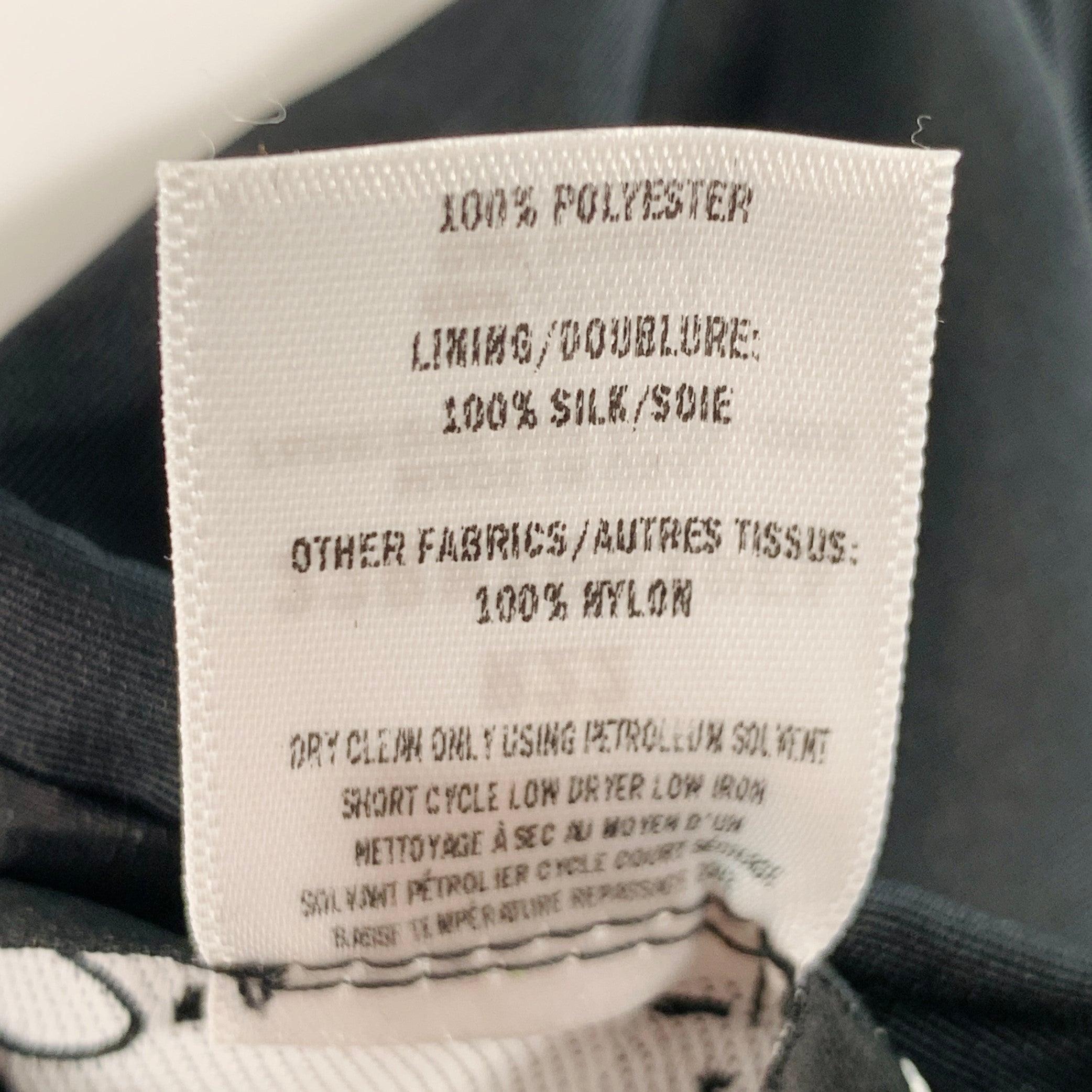 Oscar De La Renta 2022 Taille 6 Robe de cocktail midi à manches longues en taffetas noir en vente 2