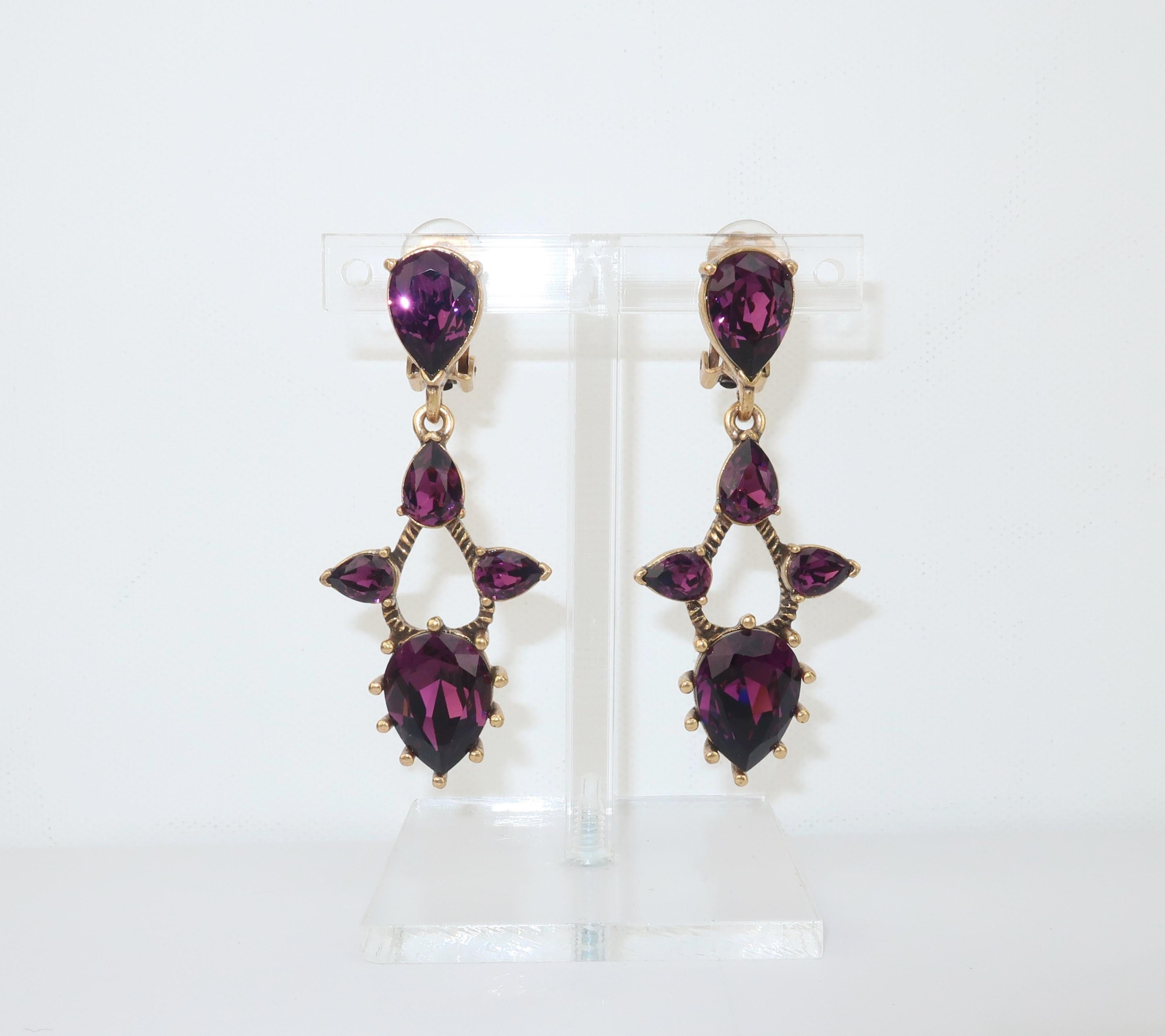 Ohhhh Oscar!  Gorgeous Oscar de La Renta amethyst crystal dangle earrings with a detailed gold tone setting and clip on hardware.  Signed at the back and also marked 'Made in U.S.A.'.  Sizable but comfortable enough for all day wear.
CONDITION
Very