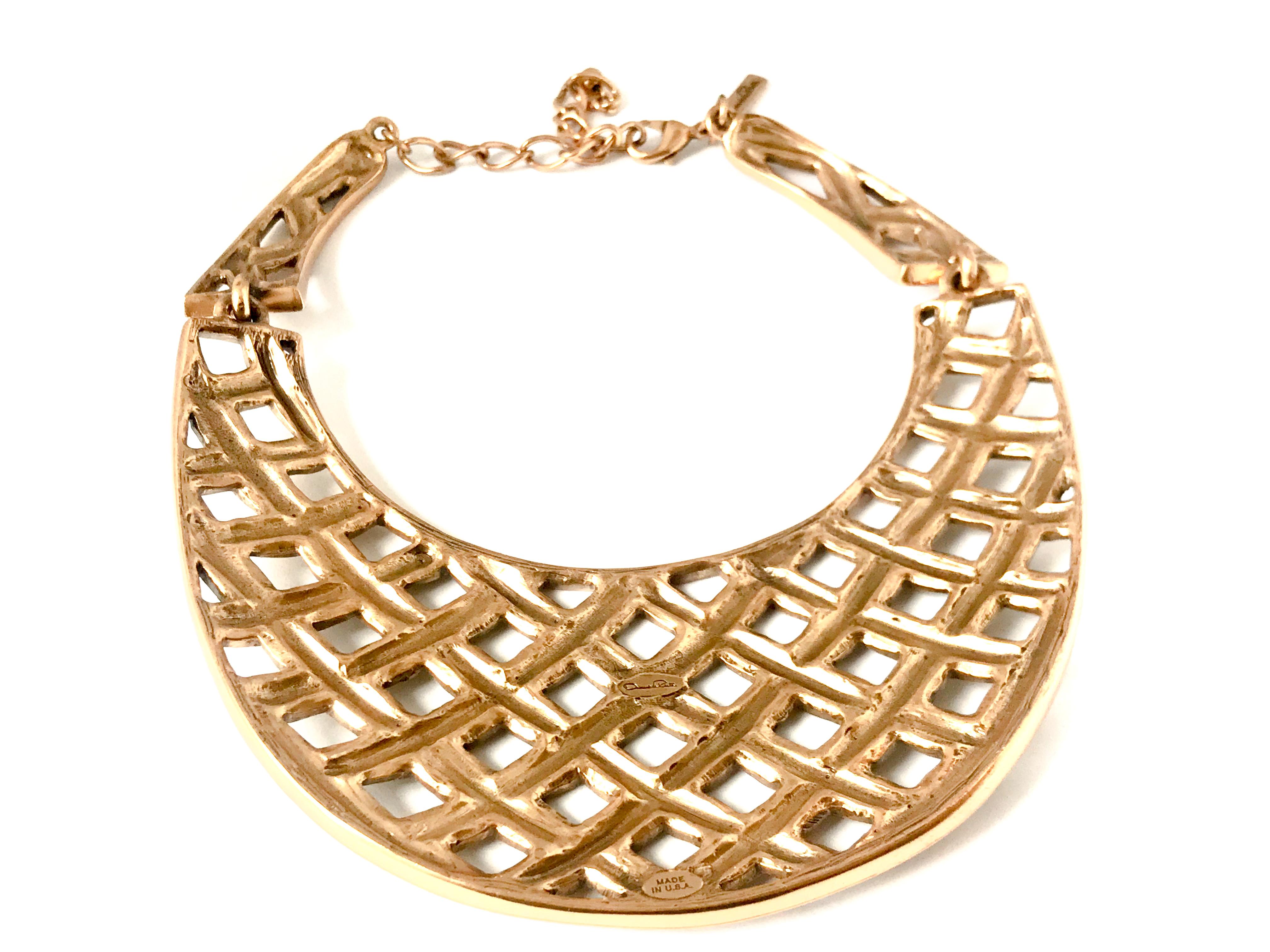New Oscar de la Renta Vintage Bib Collar Necklace.  Made of golden pewter and brass metal showcasing an intricate, geometric basketweave collar design.

excellent unworn condition

Fabulous quality, built in the USA to last a lifetime. rrp - 660