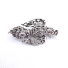 Épingle oiseau Oscar de la Renta, ton argent texturé, accents en cristal clair