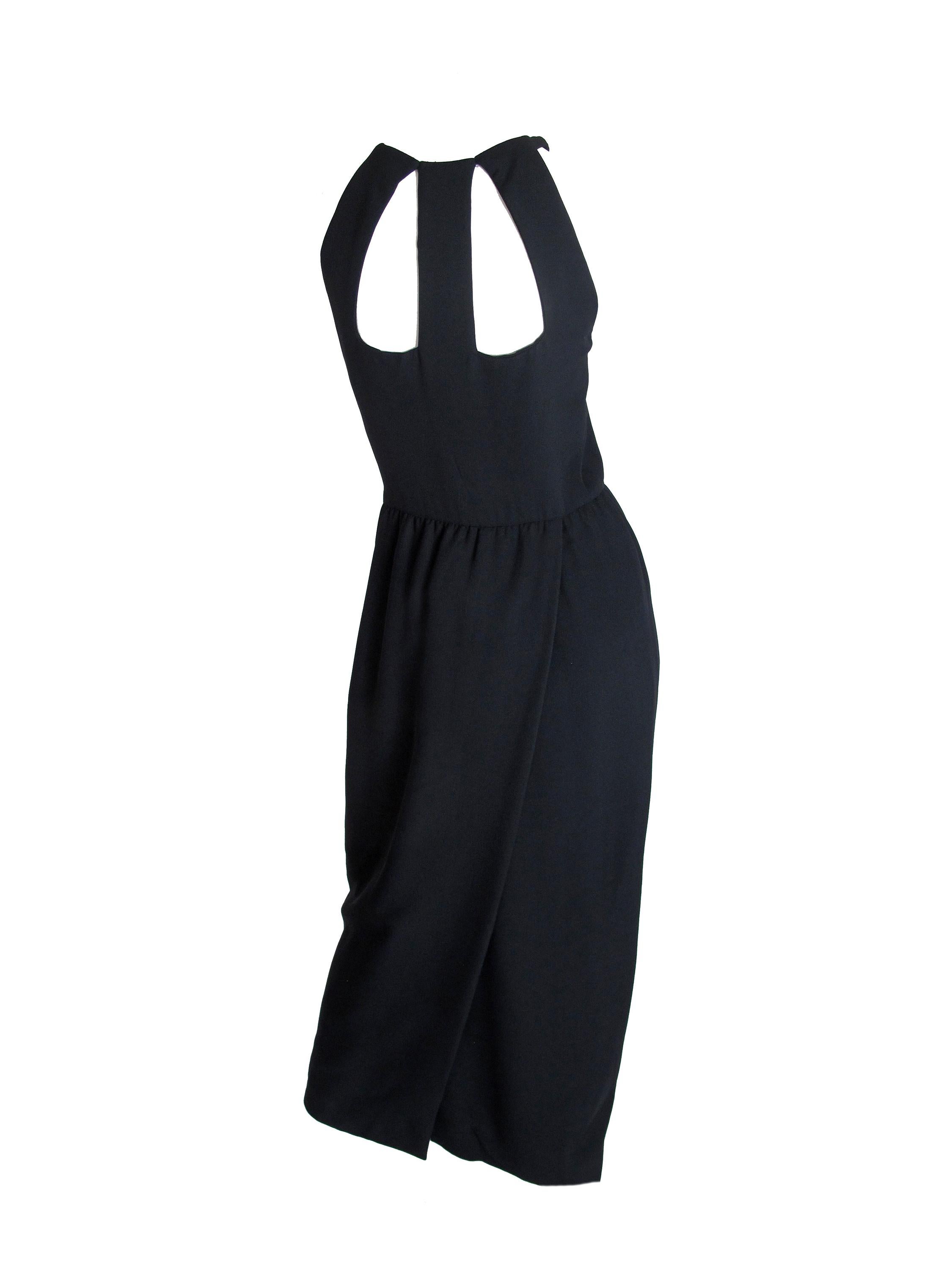 1990s Oscar de la Renta black evening dress with cut outs. Condition: Excellent. Size 6- 8