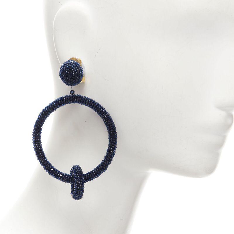 OSCAR DE LA RENTA black fully beaded double hoop drop clip on earrings
Reference: TGAS/C01474
Brand: Oscar De La Renta
Material: Plastic
Color: Black
Pattern: Solid
Closure: Clip On
Estimated Retail Price: USD 500
Made in: