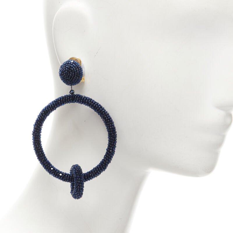 OSCAR DE LA RENTA black fully beaded double hoop drop clip on earrings
Reference: TGAS/C01474
Brand: Oscar de la Renta
Material: Plastic
Color: Black
Pattern: Solid
Closure: Clip On
Estimated Retail Price: USD 500
Made in: