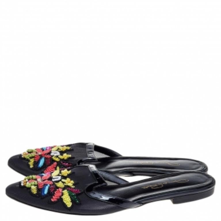 These mules from Oscar de la Renta are exquisite and easy to slip on. They've been crafted from mesh, designed with embellishments and patent leather trims, and have leather insoles meant to provide comfort at every step. This is one pair that
