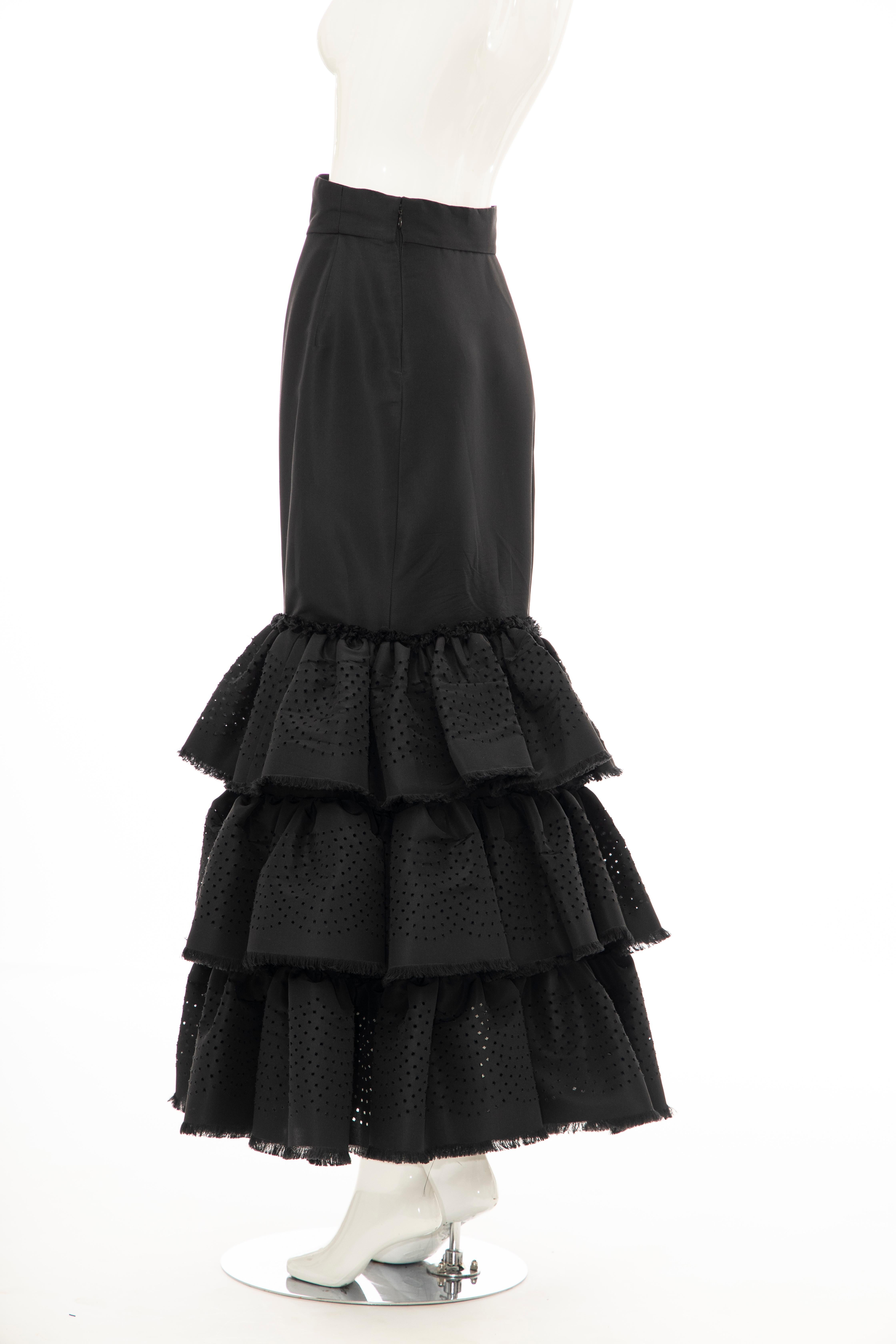 Oscar de la Renta, Fall 2001 black punched silk faille evening skirt with back zip closure.

Documented: Oscar de la Renta 