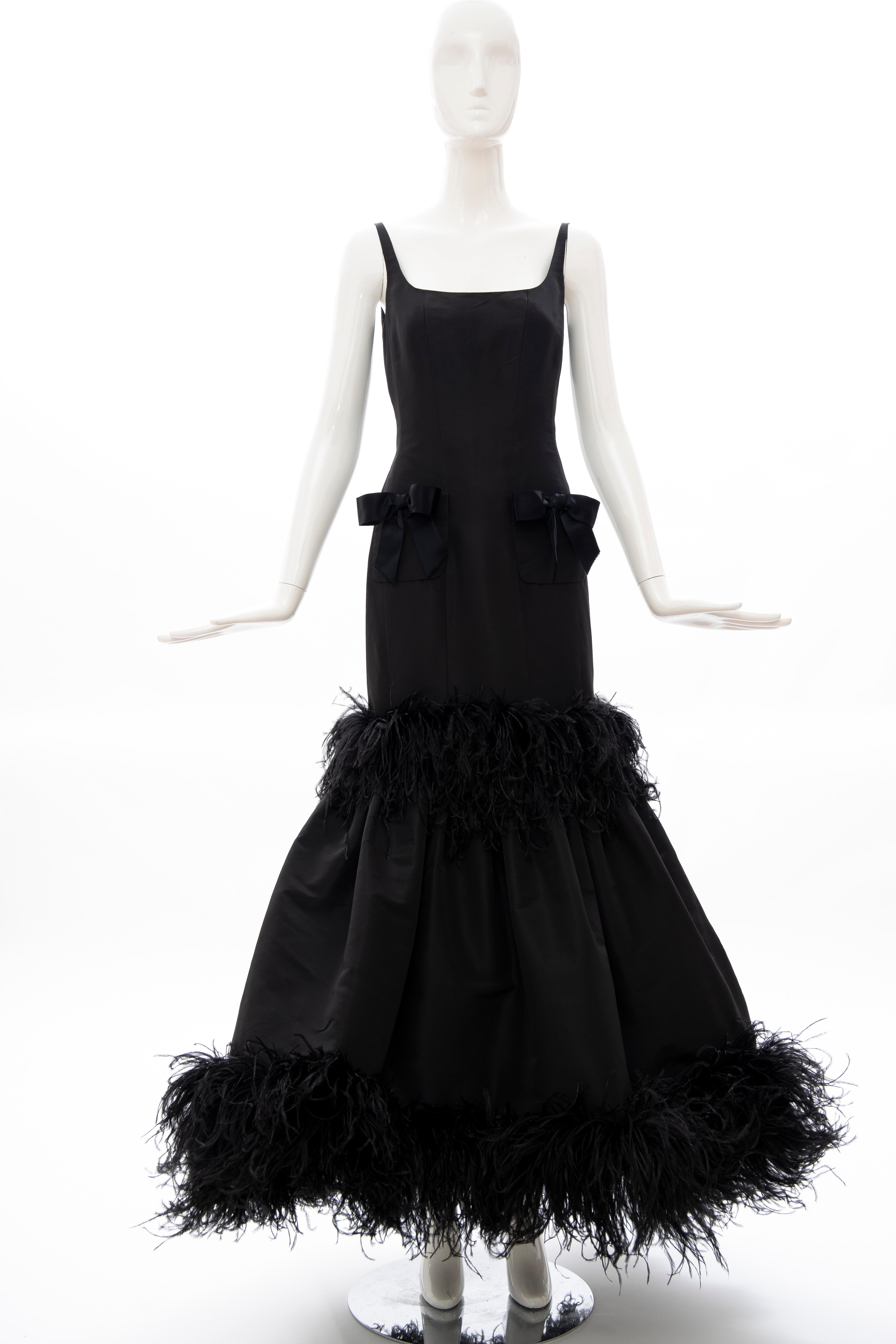 Oscar de La Renta Runway, Fall 2004 (Look 49) black silk faille evening dress with two front pockets with black silk satin bows, embroidered black feathers, tulle underskirt. concealed back zip and hook-and-eye closure, fully lined in silk.

US.