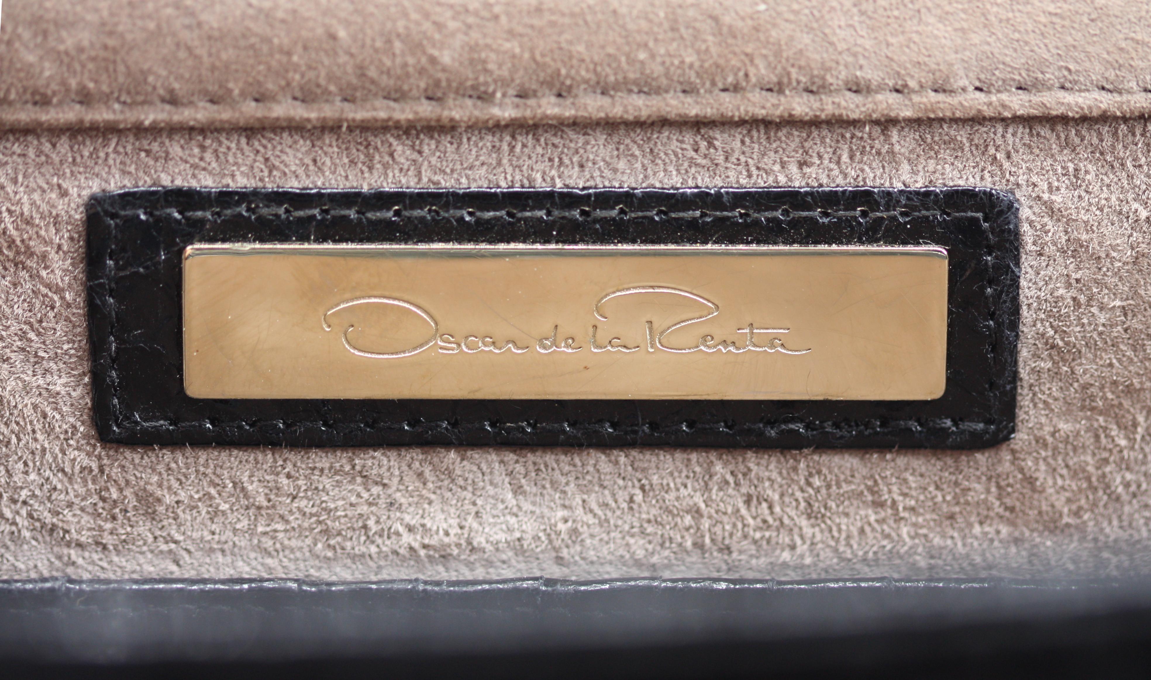 Nero Oscar De La Renta - Pochette a busta in pelle di serpente nera in vendita