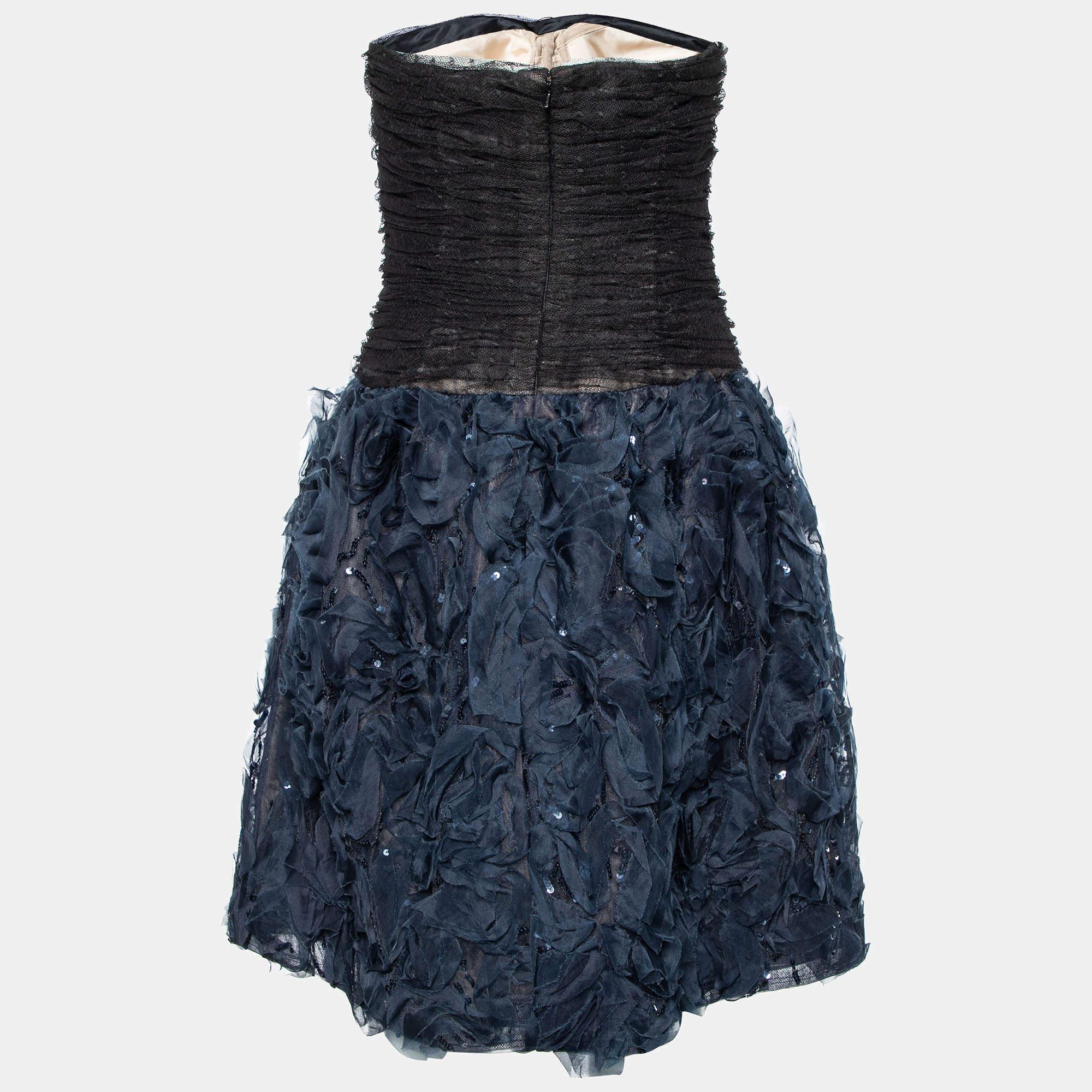 El fino arte y la silueta femenina de este vestido de diseño exhiben la impecable artesanía de sastrería de la marca. Está confeccionado con materiales de calidad, tiene un buen ajuste y se puede combinar fácilmente con accesorios elegantes,