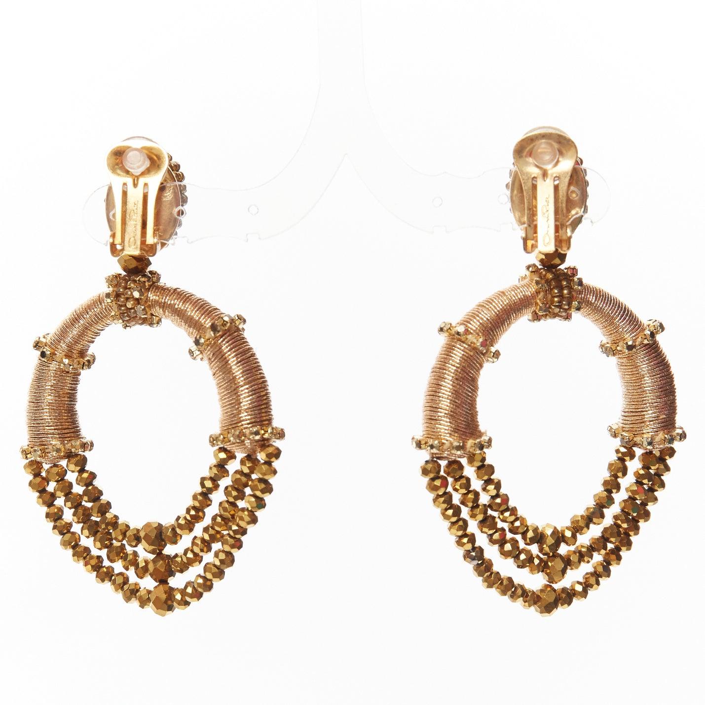 Women's OSCAR DE LA RENTA bronze gold beaded coil hoop dangling clip on earrings pair For Sale