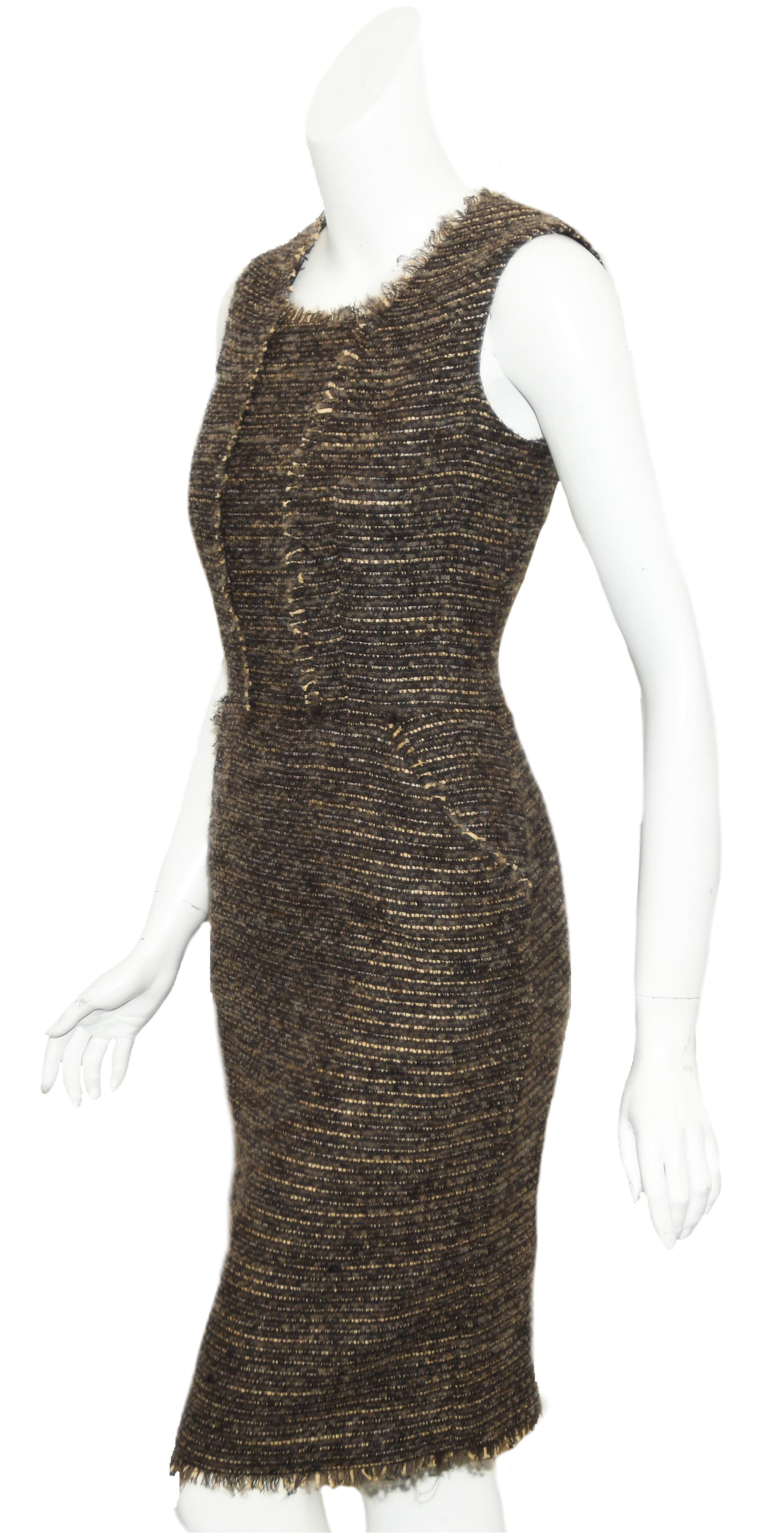 Oscar de la Renta wool tweed boucle sleeveless dress in brown and beige tones is from 2009 Fall.  This classic sheath dress features square neckline that is defined with fringe trim, that continues down the front and accentuates the two slit pockets