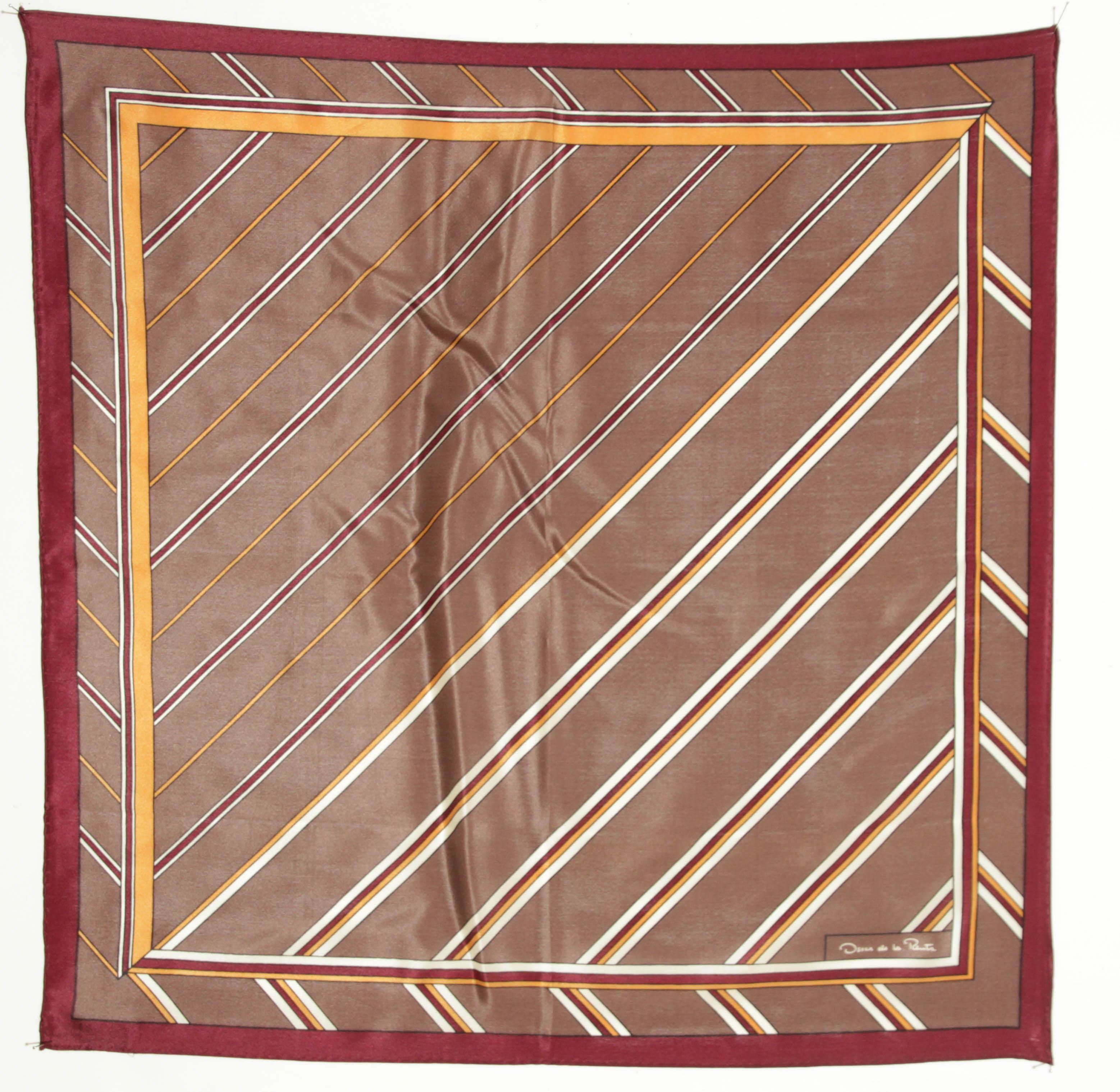 Oscar de la Renta Brown Silk Pocket Square Handkerchief Crafted in Italy.
This silk handkerchief bandanna combines geometric design.
Brown and White Silk Pocket Square.
Measurements : 20.5