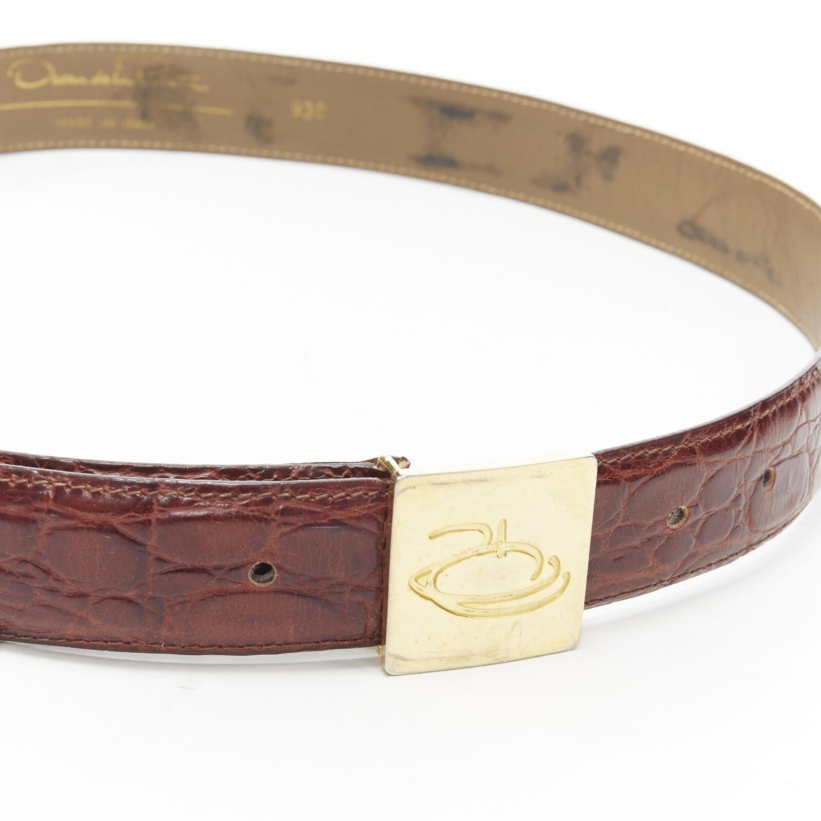 OSCAR DE LA RENTA brown stamped mock croc gold logo buckle belt 32