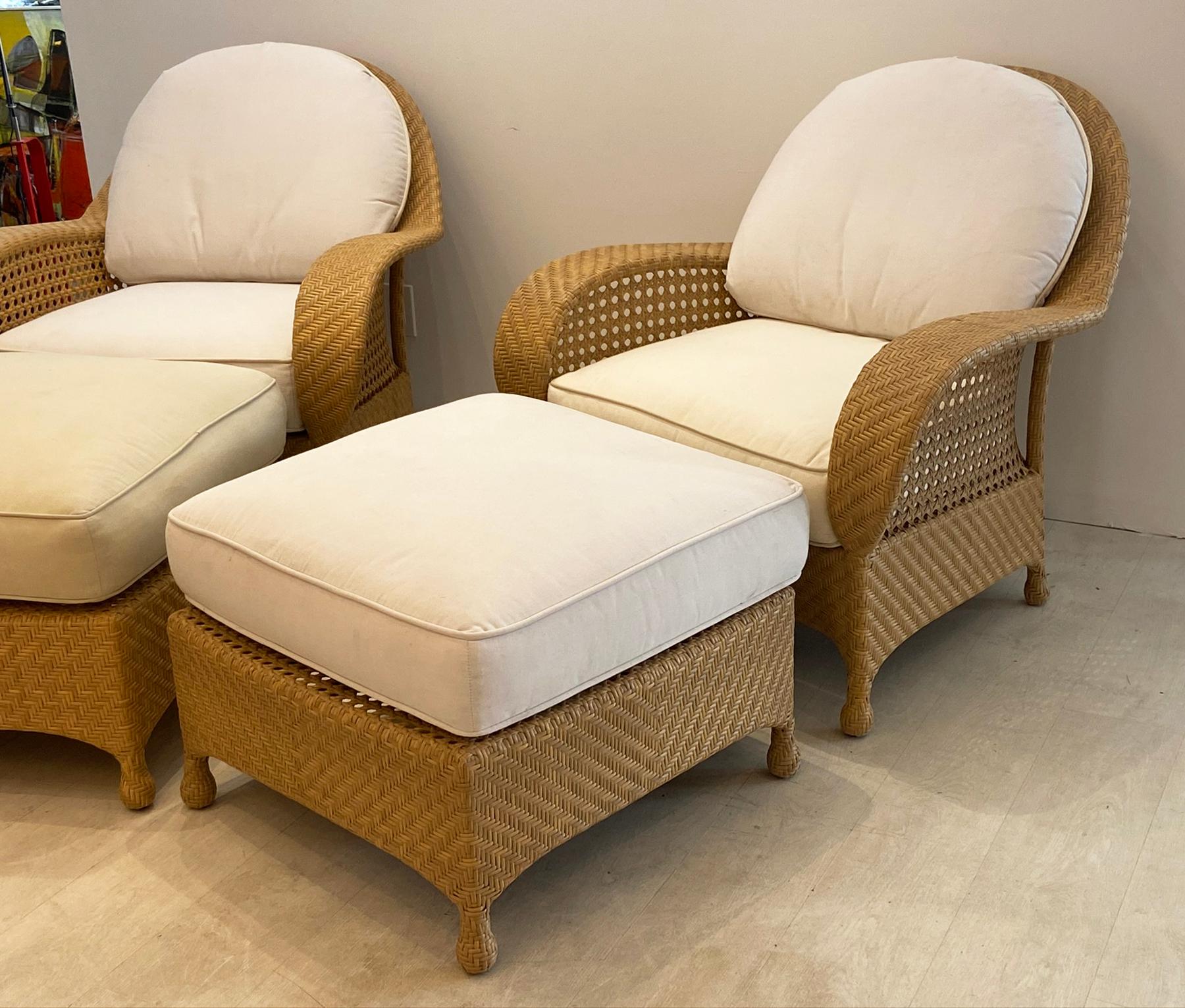 Large lounge chairs with ottomans designed by Oscar De La Renta for Century Furniture. The upholstery on these isn't quite matching but the cushions themselves are in very good condition and ready to be recovered in your fabric. Chairs are 36 inches