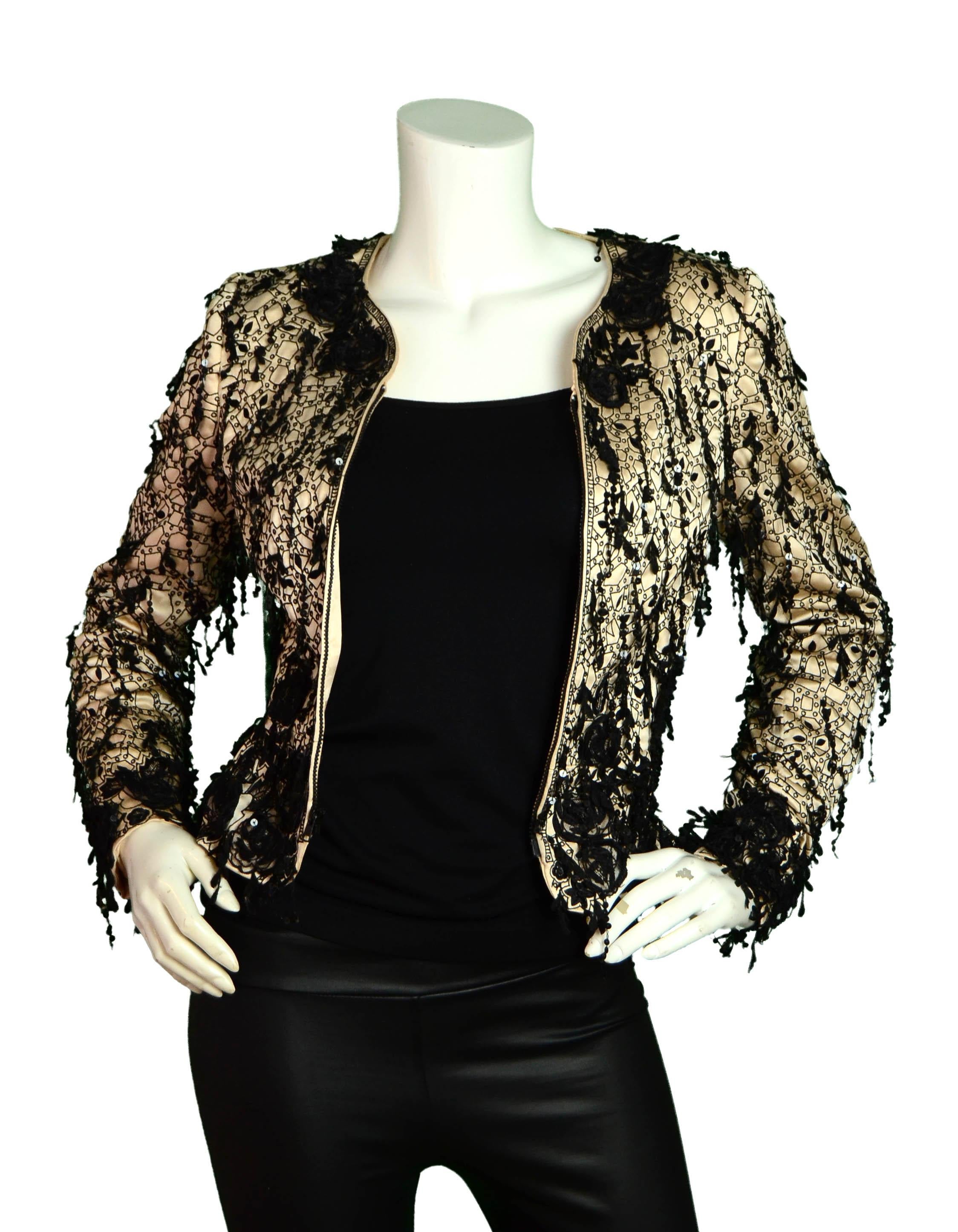Oscar de la Renta Champagne Silk Embroidered Jacket w/Sequins

Made In: USA
Color: Champagne w/black embroidery
Materials: Silk
Lining: Silk
Opening/Closure: Zipper
Overall Condition: Excellent

Tag Size: Missing *Please refer to measurements to