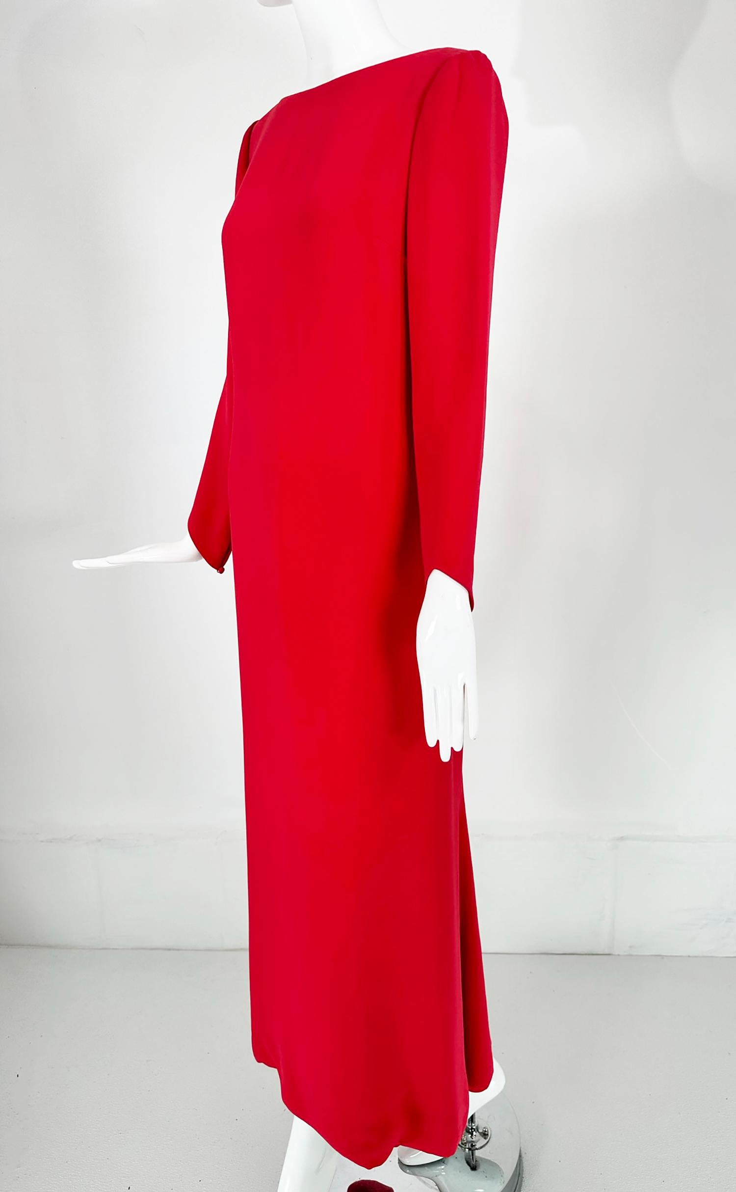 Oscar de la Renta, early 2000s, simple and elegant, coral red silk, long sleeve, bateau neck column gown with princess seams and a flared hem. A gorgeous gown to show off your curves, perfect for any special occasion. The long sleeves are shaped at