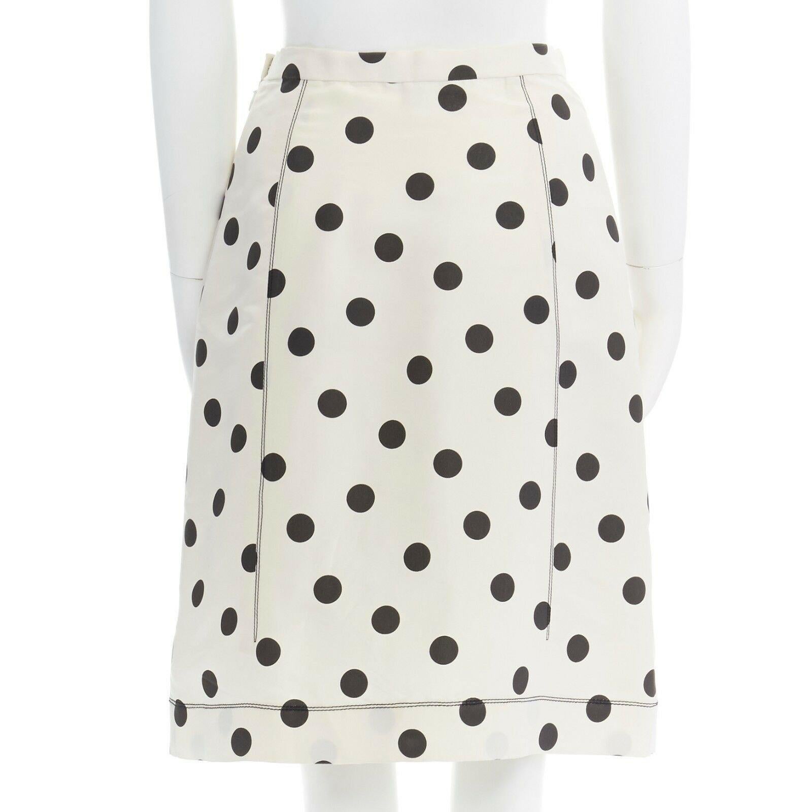 cream and black polka dot dress