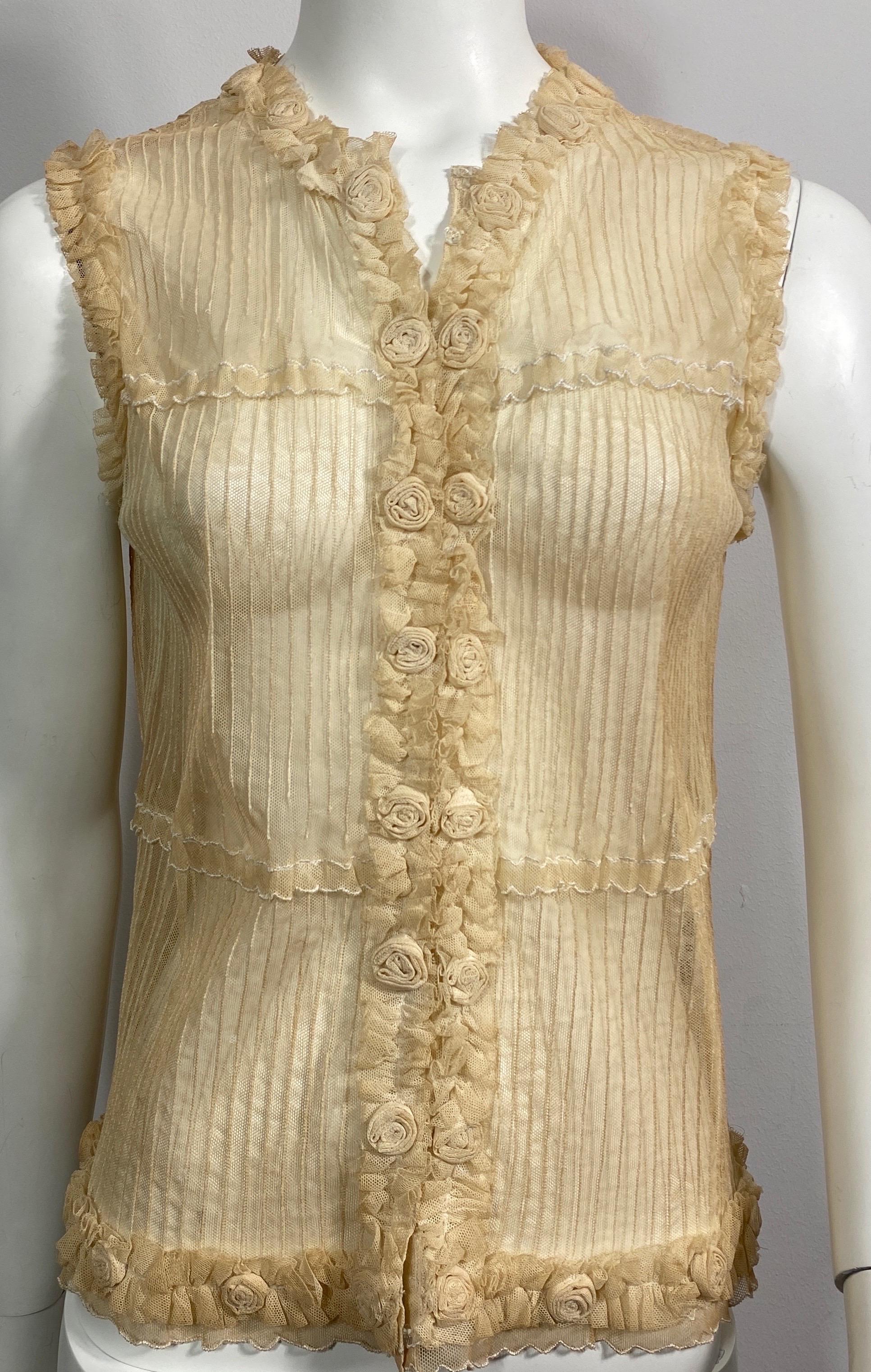 Oscar de la Renta Cream Transparent Sheer Mesh Sleeveless Top-Size 8 This cream colored see-though Sheer Mesh top has Vertical corded lines , 2 horizontal mini ruffle trim applique that have white stitching on the edges, rose petal looking detail