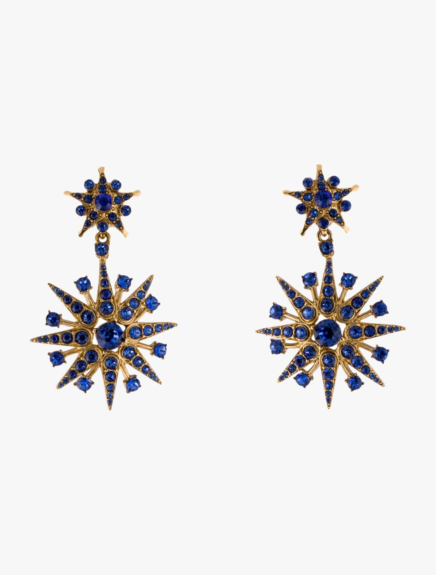 Oscar de la Renta crystal star drop clip-on earrings

Gold-Plated metal & Crystal

Length – 7 cm

Width – 4,4 cm

Marks – designer signature, Made in USA

Condition – very good

........Additional information ........

- Photo might be slightly