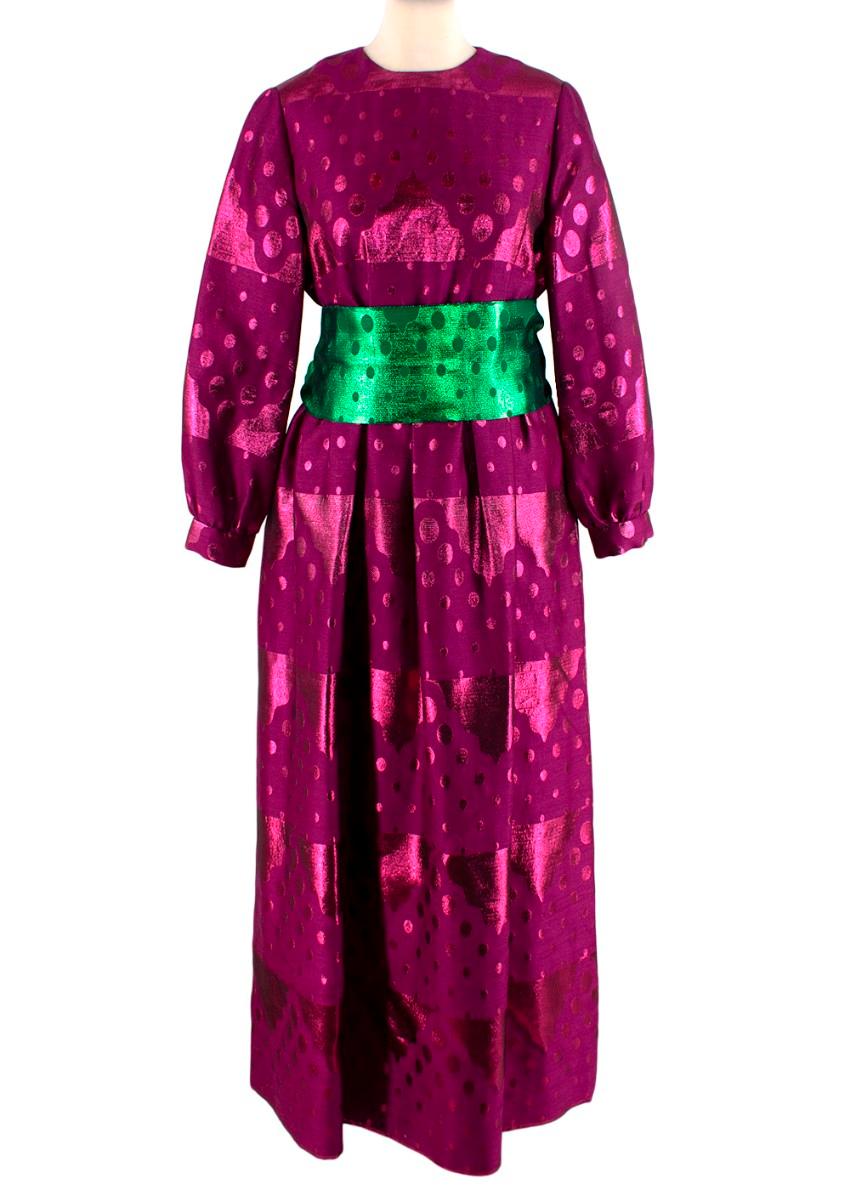 Oscar de La Renta Dark Magenta Metallic Jacquard Dress
 

 - True vintage, circa early 60's
 - Crafted from rich magenta pink-hued silk jacquard, with abstract cloud and circular shapes woven throughout
 - Round neck, long bishop sleeve with button