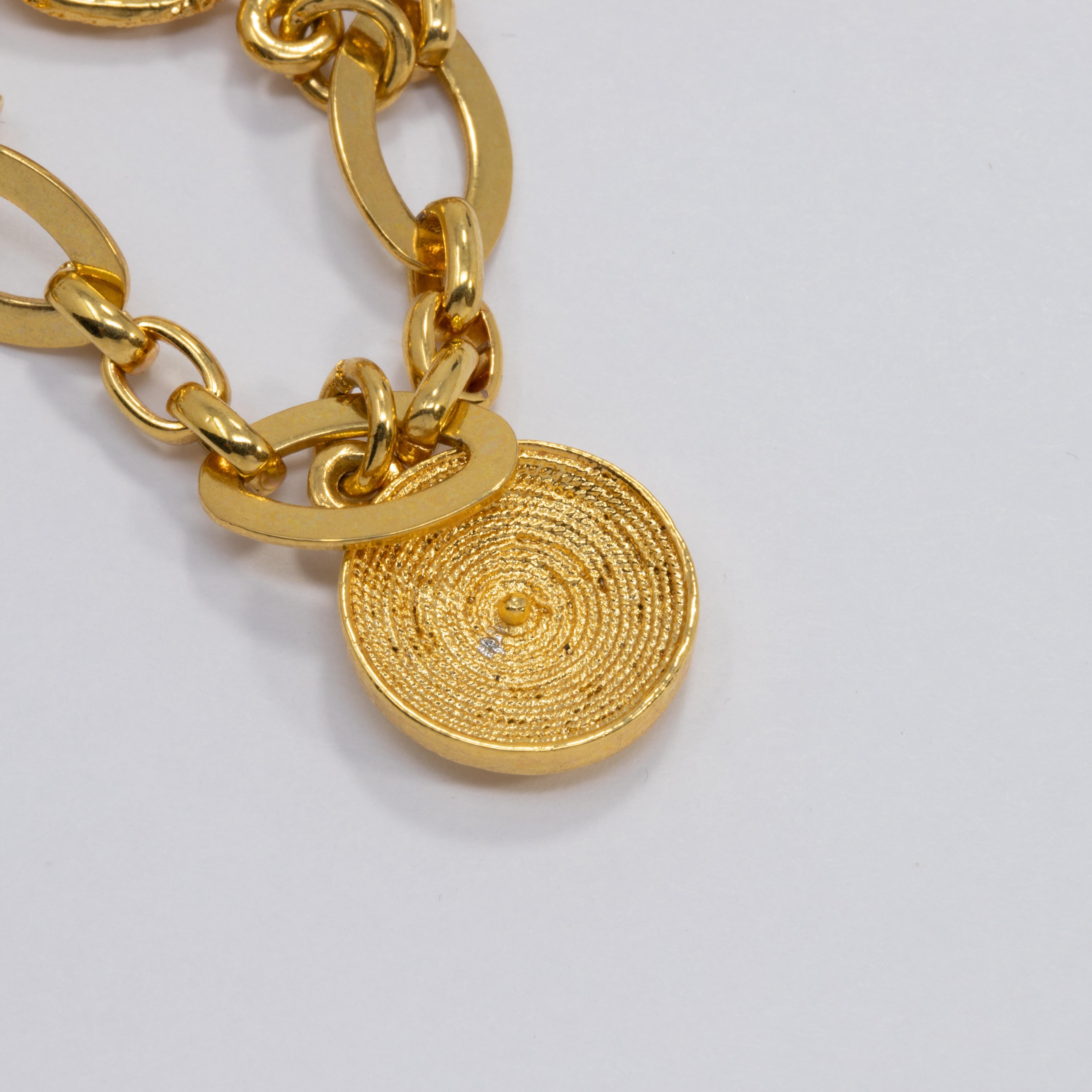 Women's or Men's Oscar de la Renta Double Strand Floral Charm Toggle Clasp Bracelet in Gold For Sale