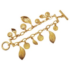 Oscar de la Renta Double Strand Floral Charm Toggle Clasp Bracelet in Gold