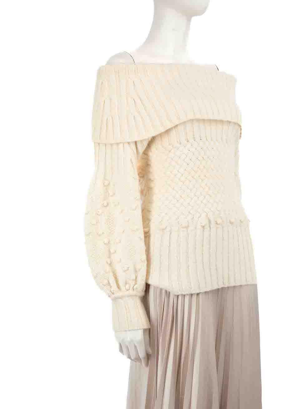CONDITION is Very good. Hardly any visible wear to jumper is evident on this used Oscar de la Renta designer resale item.
 
 Details
 Ecru
 Wool
 Cable knit jumper
 Off Shoulder
 Long sleeves
 
 
 Made in Italy
 
 Composition
 68% Wool, 29%