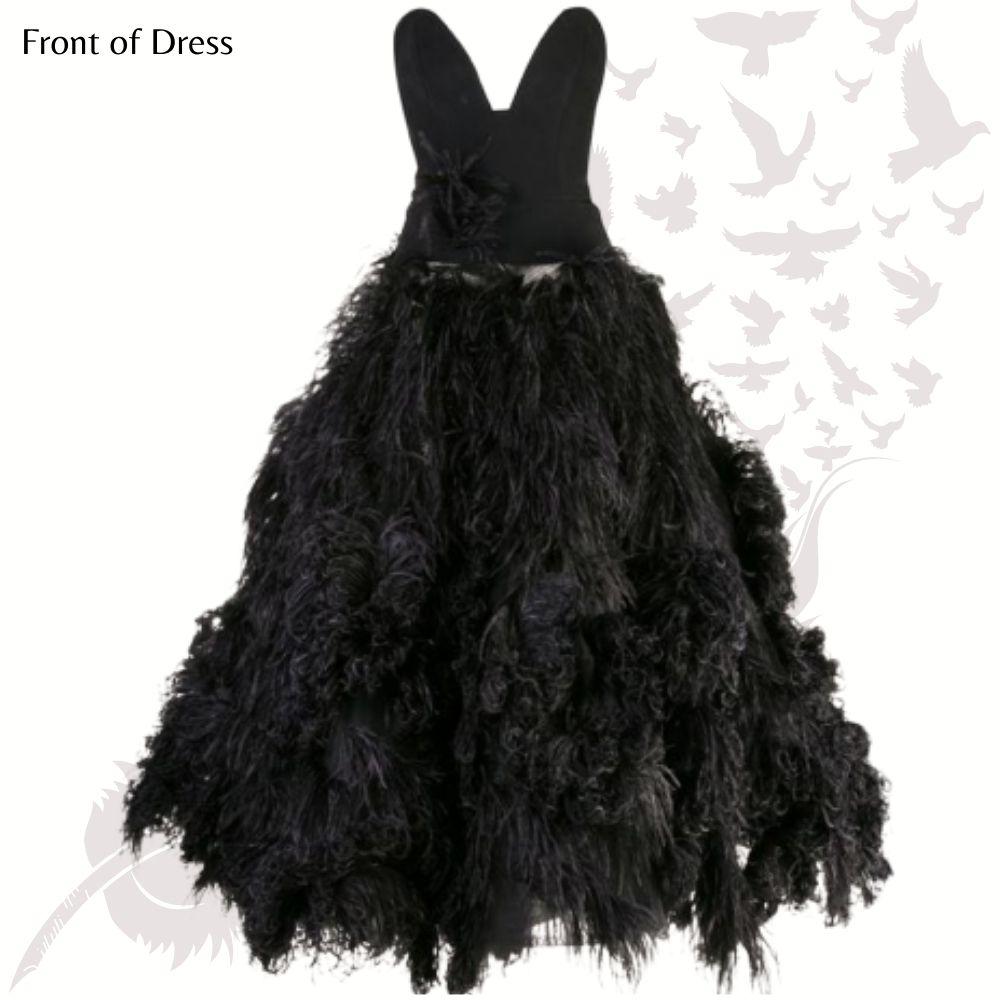Oscar de la Renta - Elegant, black ostrich feather ball gown.  This voluminous gown is made of tulle and ostrich feathers. The bodice has a deep cut sweetheart neckline. The fit is snug at the waist and flairs out like a sweeping princess gown.  The