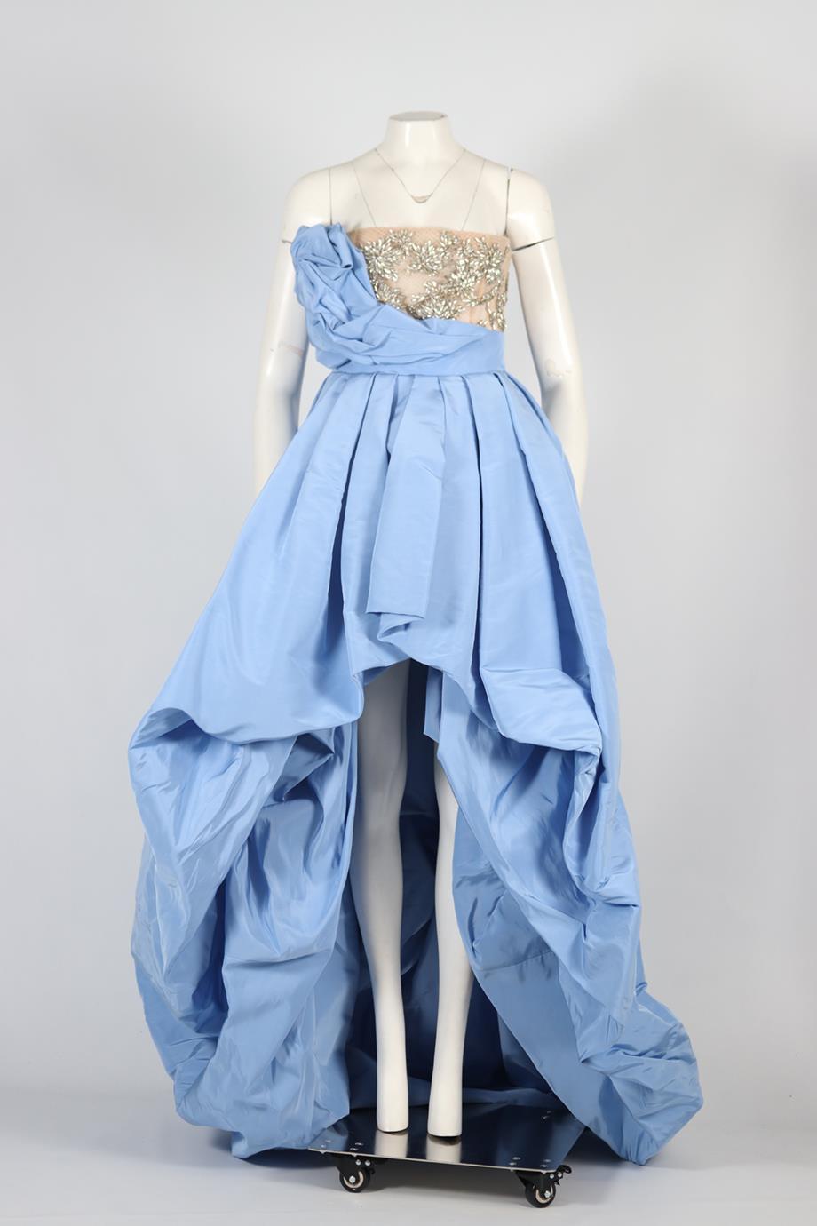 <ul>
<li>Oscar De La Renta Embellished Tulle Gown.</li>
<li>Blue.</li>
<li>Short Sleeve.</li>
<li>Bandeau.</li>
<li>Zip fastening - Back.</li>
<li>100% Silk.</li>
<li>100% Polyamide.</li>
<li>100% Silk.</li>
<li>100% Polyester.</li>
<li>100%