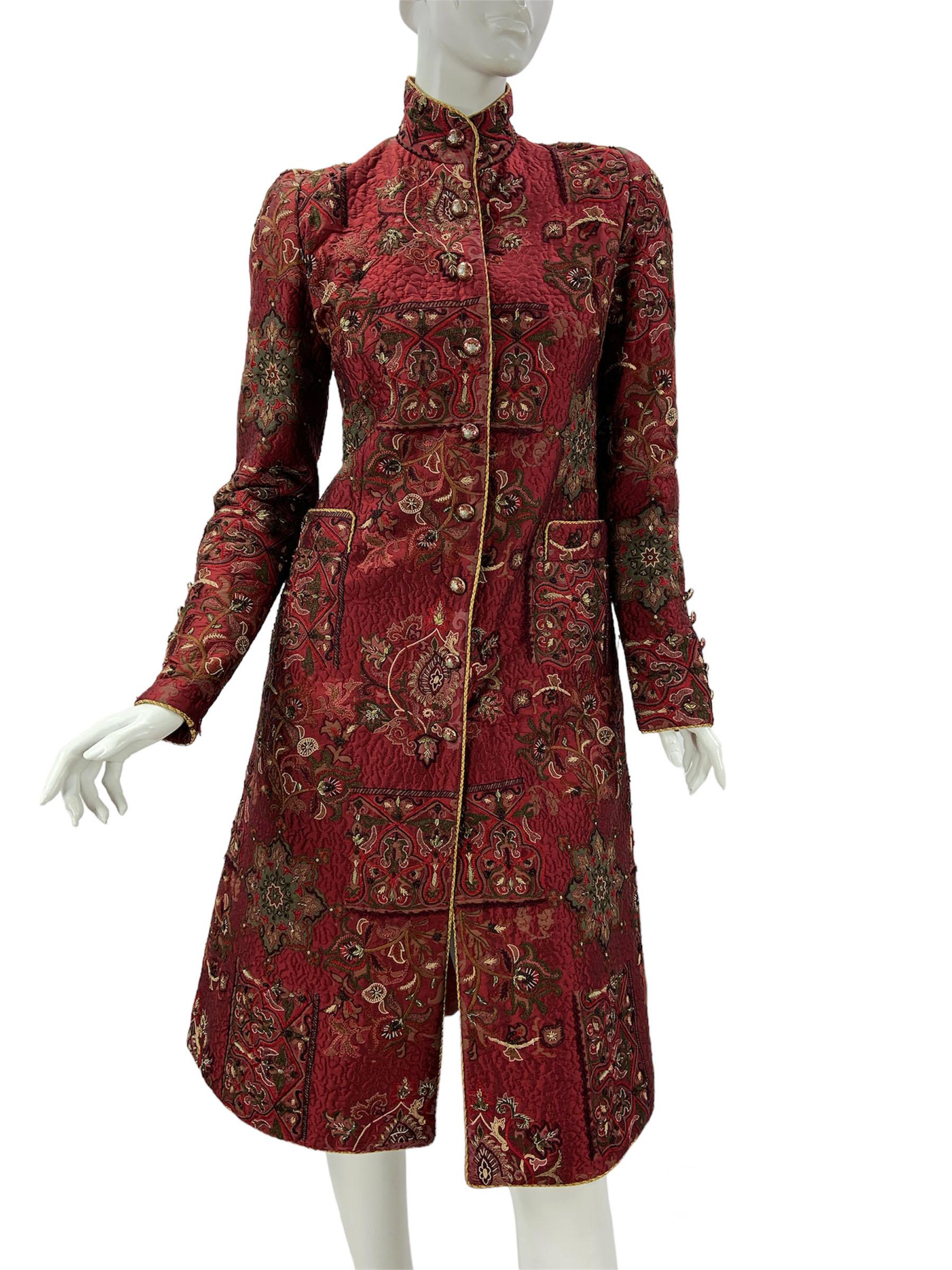 Oscar de la Renta Silk Burgundy Quilted Embellished Coat
US size - 4
Burgundy, lightly quilted silk coat is printed with tapestry inspired motifs that are decorated with elaborate tambour stitching and embroidery, along with brass leaf beads. Coat